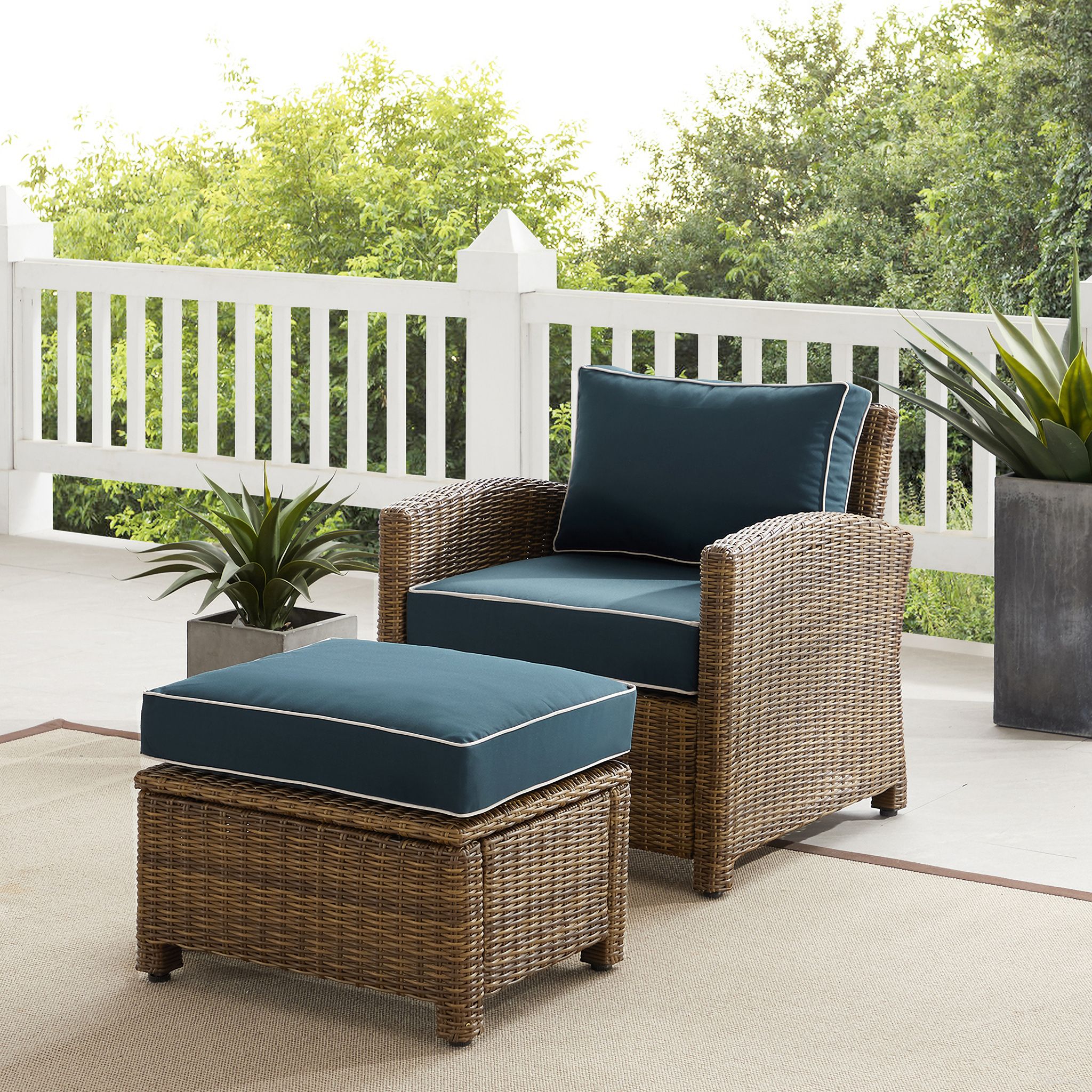 The appearance of Bradenton Wicker Outdoor Chair Set of 2 In Navy and Weathered Brown designed by Crosley Brands in the traditional interior design. This navy piece of furniture  was selected by 1StopBedrooms from Bradenton Collection to add a touch of cosiness and style into your home. Sku: CO7116-WB;CO7126-WB;MO74991-NV. Material: Polyester.