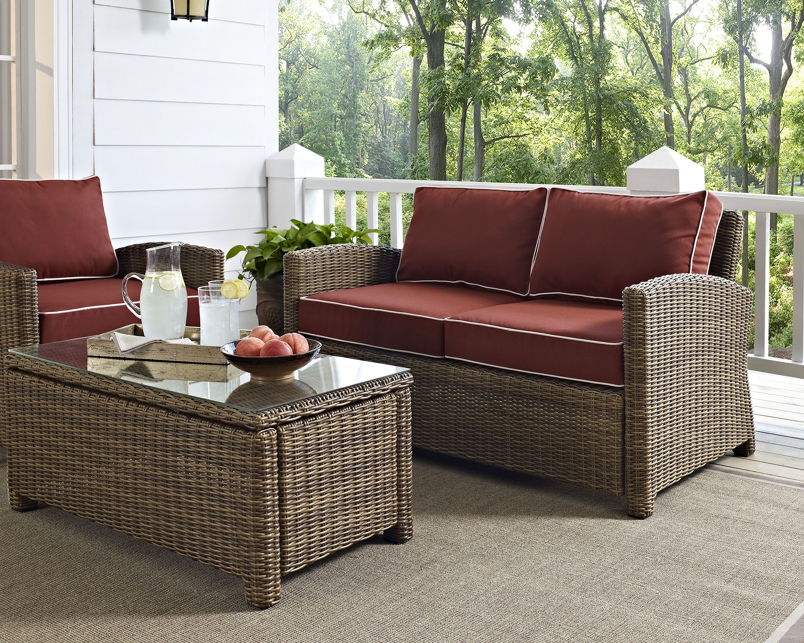 The appearance of Bradenton Wicker Outdoor Loveseat In Sangria and Weathered Brown designed by Crosley Brands in the traditional interior design. This sangria piece of furniture was selected by 1StopBedrooms from Bradenton Collection to add a touch of cosiness and style into your home. Sku: CO7115-WB;MO7499-SG. Material: Polyester.