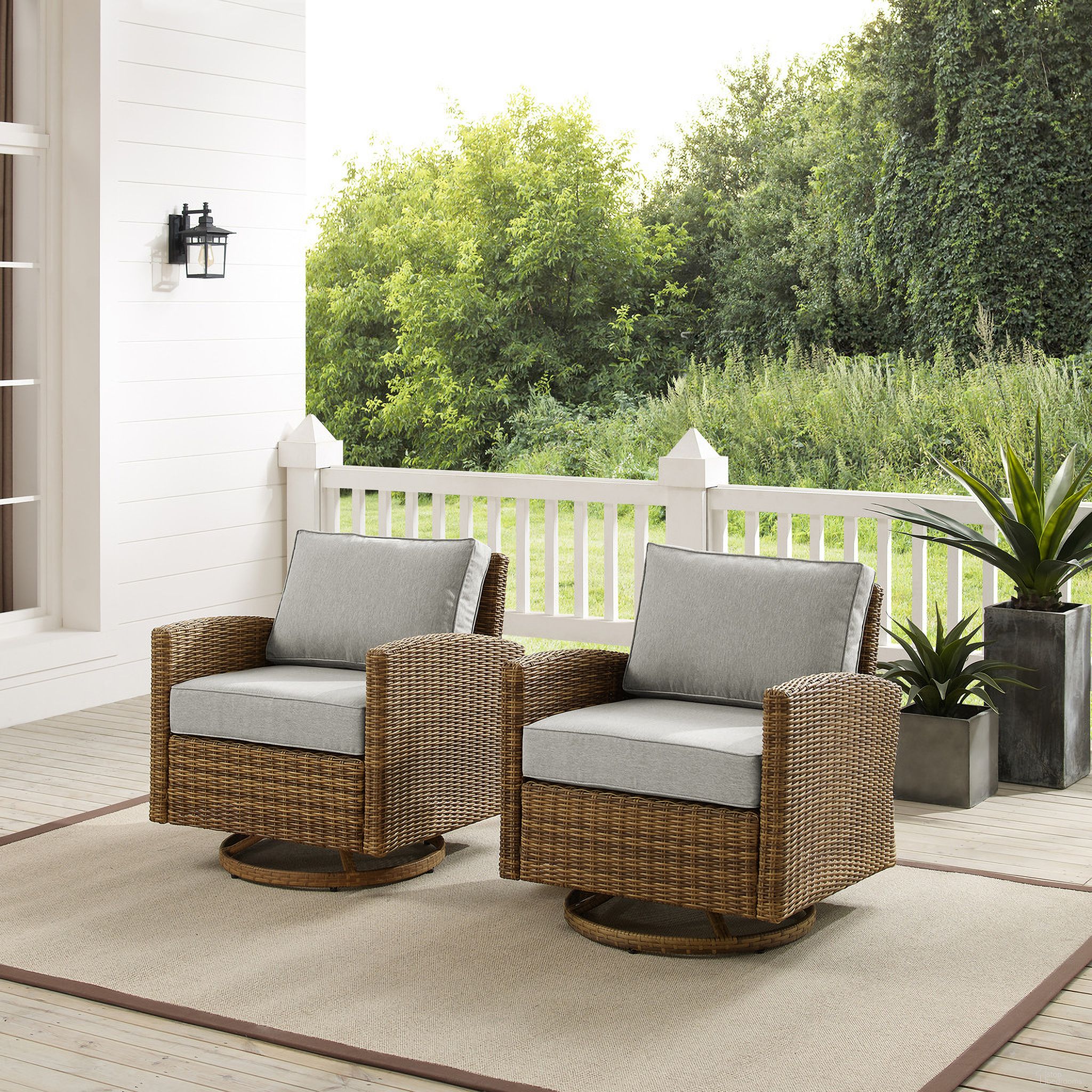 The appearance of Bradenton Wicker Swivel Rocker Outdoor Chair In Gray and Weathered Brown - Set of 2 designed by Crosley Brands in the traditional interior design. This gray piece of furniture was selected by 1StopBedrooms from Bradenton Collection to add a touch of cosiness and style into your home. Sku: CO7127-WB;CO7127-WB;MO7499-GY. Material: Polyester.