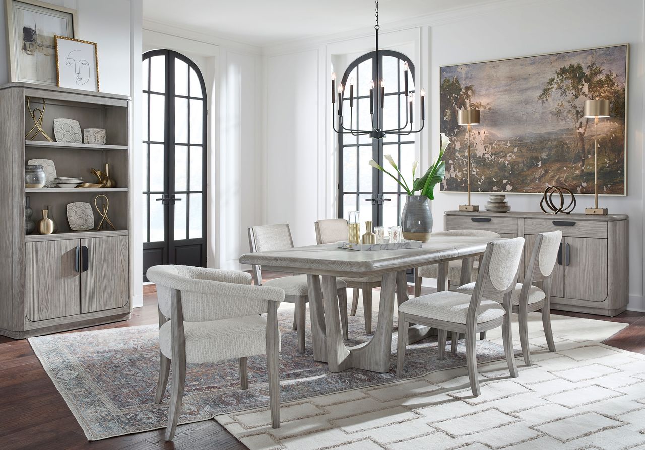 The appearance of Braelyn Extendable Trestle Dining Set In Dorian Grey designed by Magnussen in the transitional interior design. This dorian grey piece of furniture was selected by 1StopBedrooms from Braelyn Collection to add a touch of cosiness and style into your home. Sku: D5874-21;D5874-63. Table Top Shape: Rectangular. Size: 90" x 40". Material: Oak Veneer.