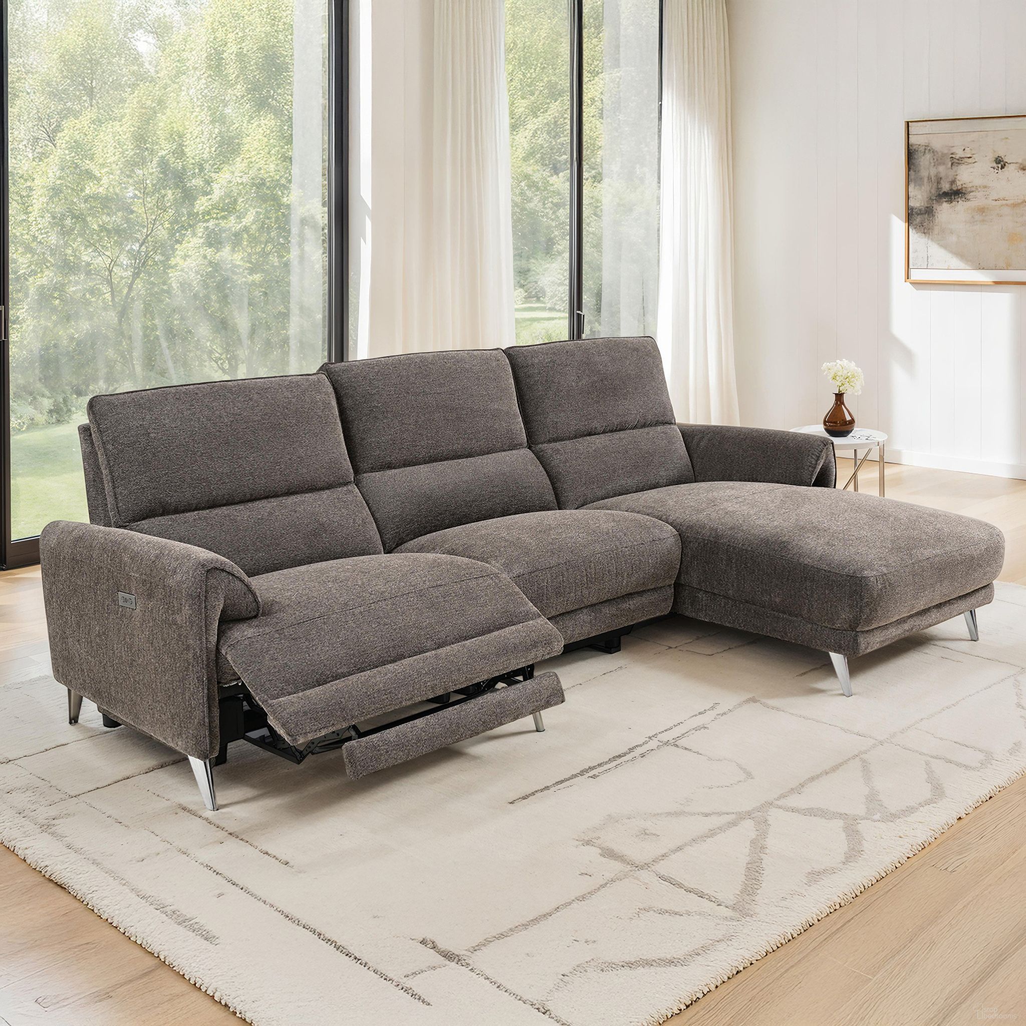 The appearance of Brande Right Chaise Power Sectional In Brown designed by Furniture of America in the modern / contemporary interior design. This brown piece of furniture was selected by 1StopBedrooms from Brande Collection to add a touch of cosiness and style into your home. Sku: CM9938BR-AC;CM9938BR-LCH-PM;CM9938BR-RCE. Material: Chenille.