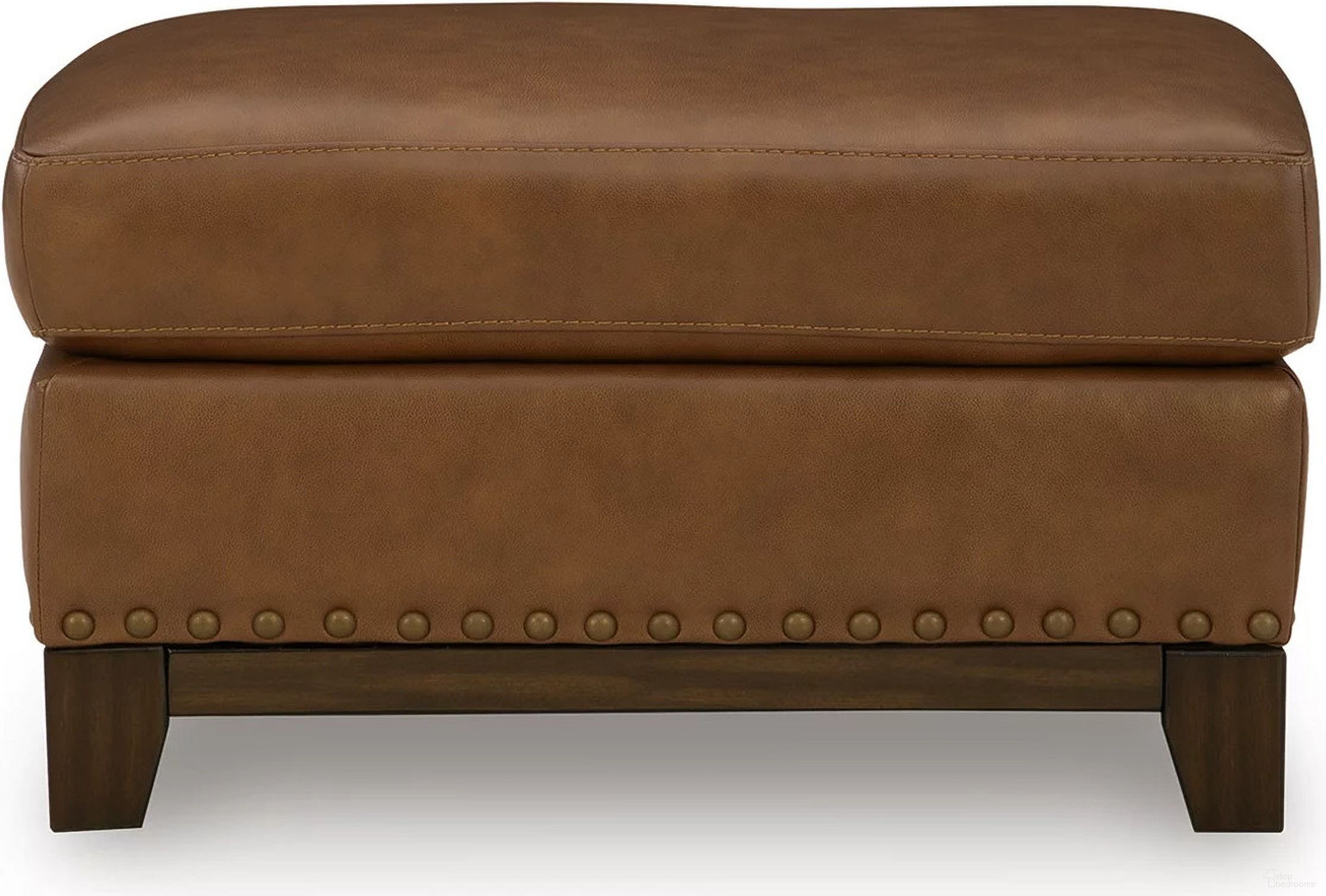 The appearance of Brendola Ottoman In Amber designed by Signature Design by Ashley in the transitional interior design. This amber piece of furniture was selected by 1StopBedrooms from Brendola Collection to add a touch of cosiness and style into your home. Sku: NC7310914. Material: Faux Leather.