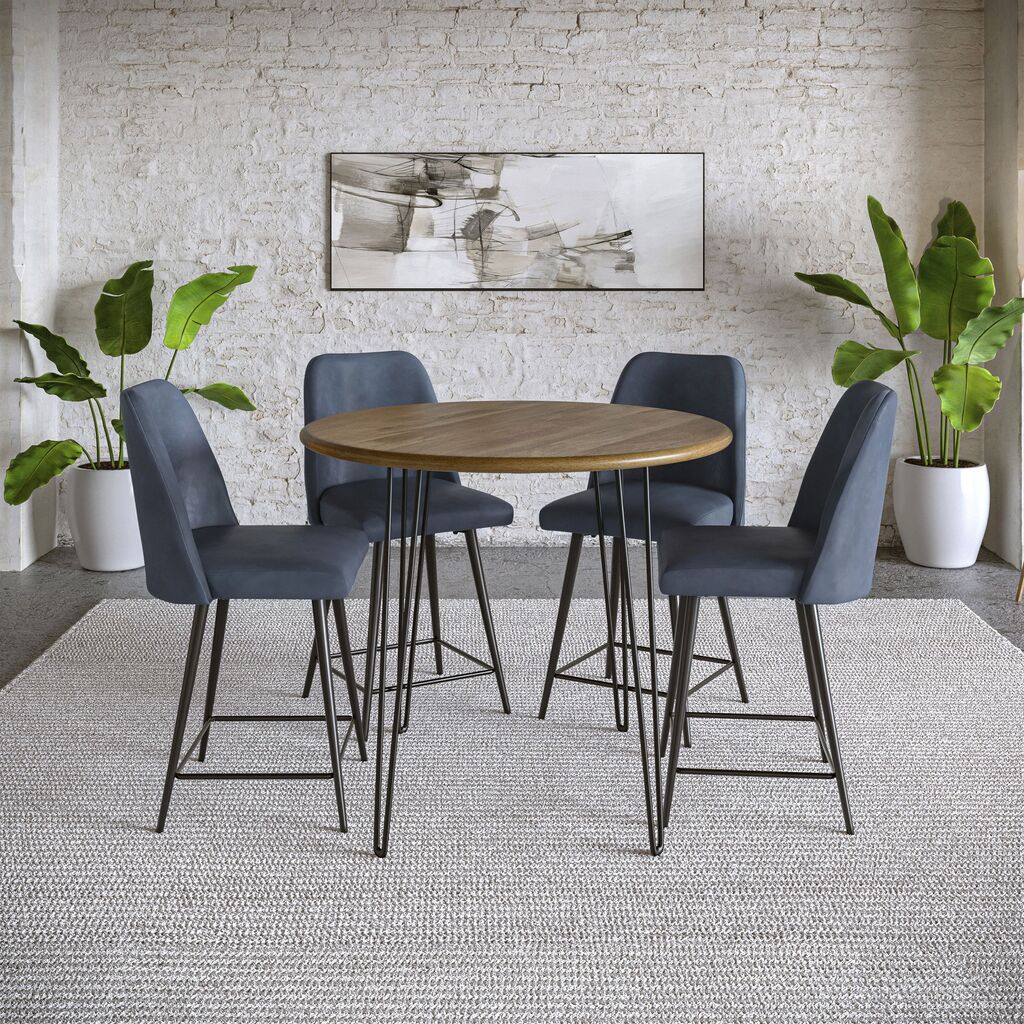 The appearance of Brennan 5 Piece Round Counter Height Dining Set with Upholstered Barstools In Blueberry designed by Jofran in the modern / contemporary interior design. This blueberry piece of furniture was selected by 1StopBedrooms from Brennan Collection to add a touch of cosiness and style into your home. Sku: 2271-BRENNANCTG;2271-MADDOXSTBLB;2271-MADDOXSTBLB. Material: Iron.