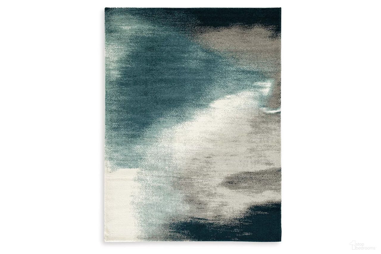 The appearance of Brentward 8' x 10' Rug In Blue/Gray/Ivory designed by Signature Design by Ashley in the modern / contemporary interior design. This blue/gray/ivory piece of furniture  was selected by 1StopBedrooms from Brentward Collection to add a touch of cosiness and style into your home. Sku: R407081. Material: Fabric.
