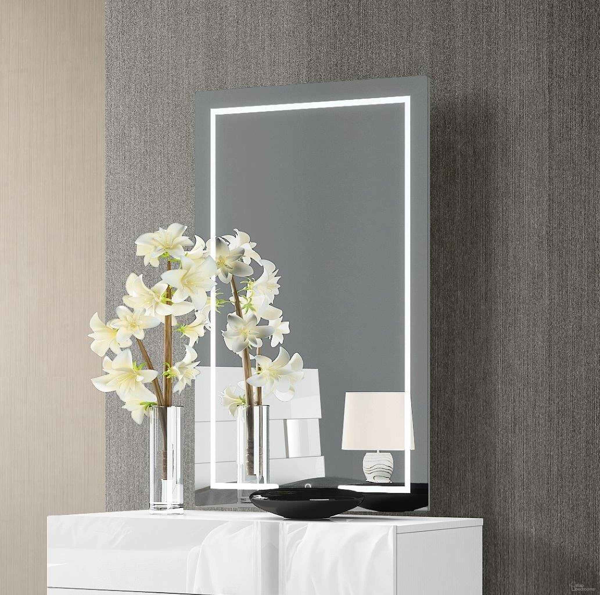 The appearance of Brett/Daisy/Raven Led Rectangle Mirror designed by Whiteline Modern Living in the modern / contemporary interior design. This glass piece of furniture was selected by 1StopBedrooms from Brett Collection to add a touch of cosiness and style into your home. Sku: MR1722S-LED. Material: Glass.