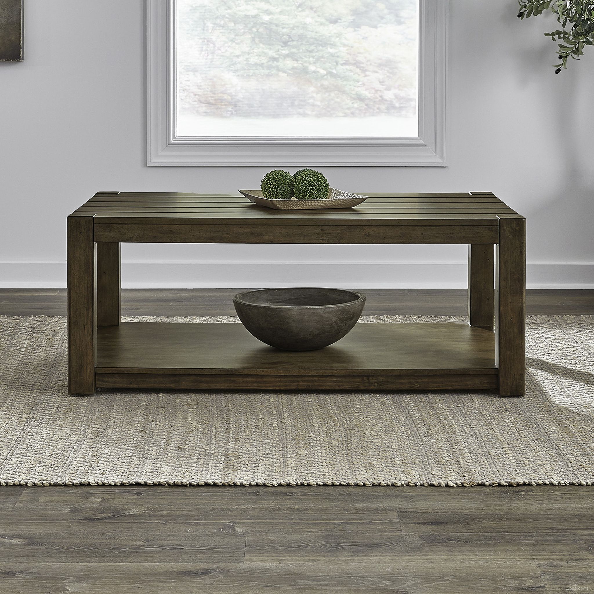 The appearance of Broadmore Rectangular Cocktail Table In Brown designed by Liberty in the transitional interior design. This brown piece of furniture  was selected by 1StopBedrooms from Broadmore Collection to add a touch of cosiness and style into your home. Sku: 449-OT1010. Material: Solid Pine.