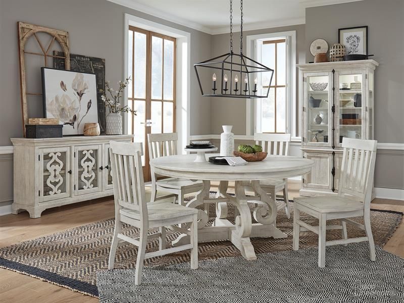The appearance of Bronwyn Chalk White 48" Round Dining Room Set designed by Magnussen in the transitional interior design. This white piece of furniture was selected by 1StopBedrooms from Bronwyn Collection to add a touch of cosiness and style into your home. Sku: D4436-22T;D4436-22B;D4436-60. Table Base Style: Pedestal. Table Top Shape: Round. Material: Pine. Size: 48".