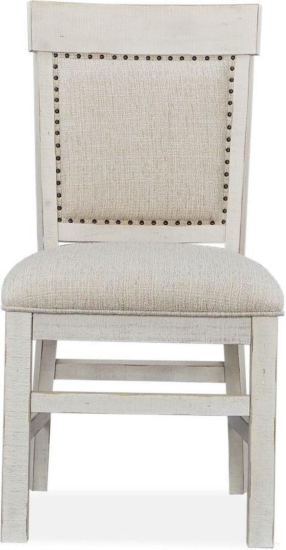 The appearance of Bronwyn Chalk White Upholstered Dining Side Chair Set Of 2 designed by Magnussen in the transitional interior design. This white piece of furniture was selected by 1StopBedrooms from Bronwyn Collection to add a touch of cosiness and style into your home. Sku: D4436-63. Material: Pine. Chair Type: Side Chair.