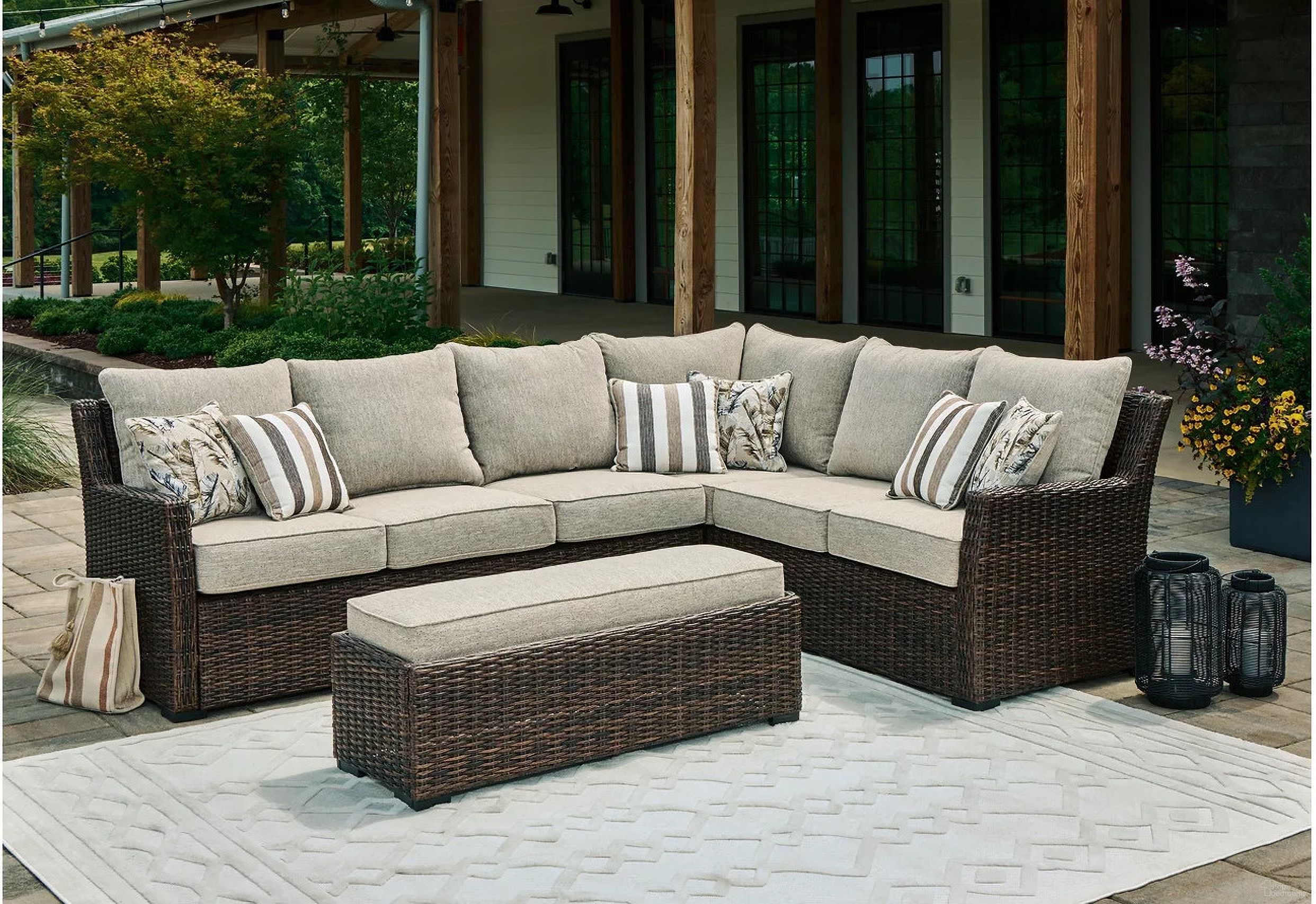 The appearance of Brook Ranch Outdoor Sofa Sectional Conversation Set In Brown designed by Signature Design by Ashley in the transitional interior design. This brown piece of furniture  was selected by 1StopBedrooms from Brook Ranch Collection to add a touch of cosiness and style into your home. Sku: P465-625;P465-820;P465-822. Material: Fabric.