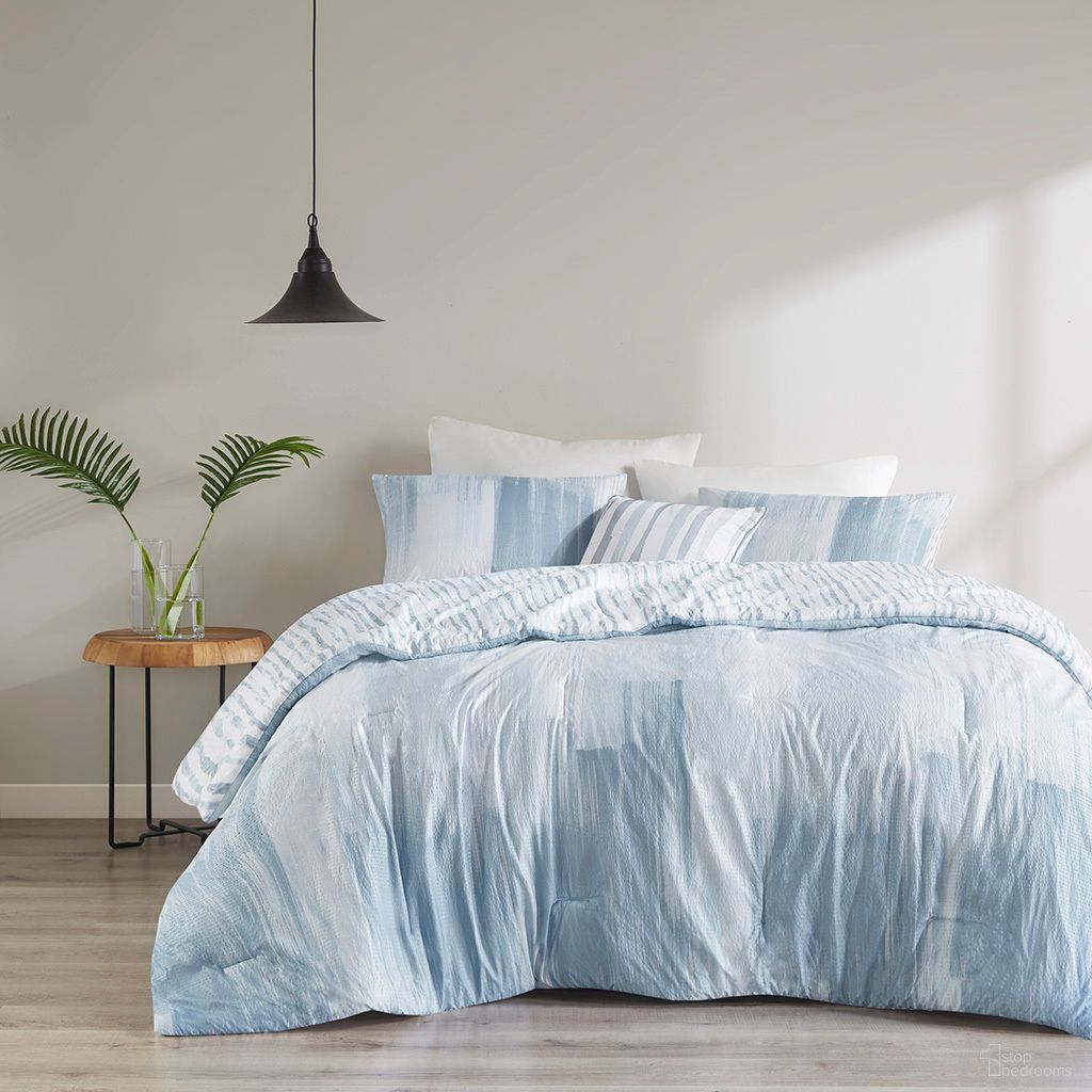The appearance of Brush Stroke 4 Piece Oversized Reversible Seersucker King Comforter Set In Blue designed by Olliix in the transitional interior design. This blue piece of furniture was selected by 1StopBedrooms from Brush Stroke Collection to add a touch of cosiness and style into your home. Sku: NS10-3706. Material: Polyester. Bed Size: King.