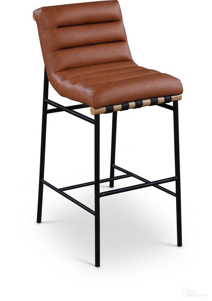 The appearance of Burke Vegan Leather Bar Stool In Cognac and Black designed by Meridian in the modern / contemporary interior design. This cognac and black piece of furniture was selected by 1StopBedrooms from Burke Collection to add a touch of cosiness and style into your home. Sku: 846Cognac-C. Material: Vegan Leather.