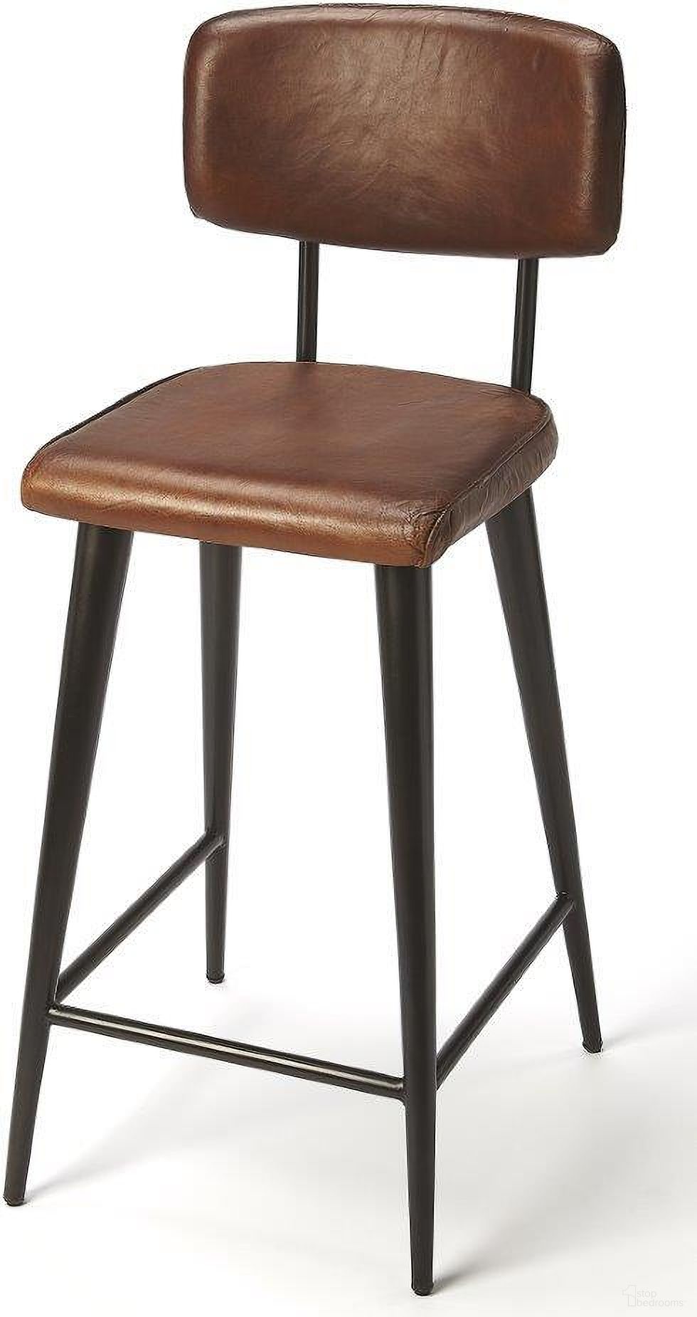 The appearance of Butler Saddle Brown Leather Bar Stool designed by Butler Specialty Company in the transitional interior design. This dark brown piece of furniture was selected by 1StopBedrooms from Industrial Chic Collection to add a touch of cosiness and style into your home. Sku: 5378344. Material: Iron.