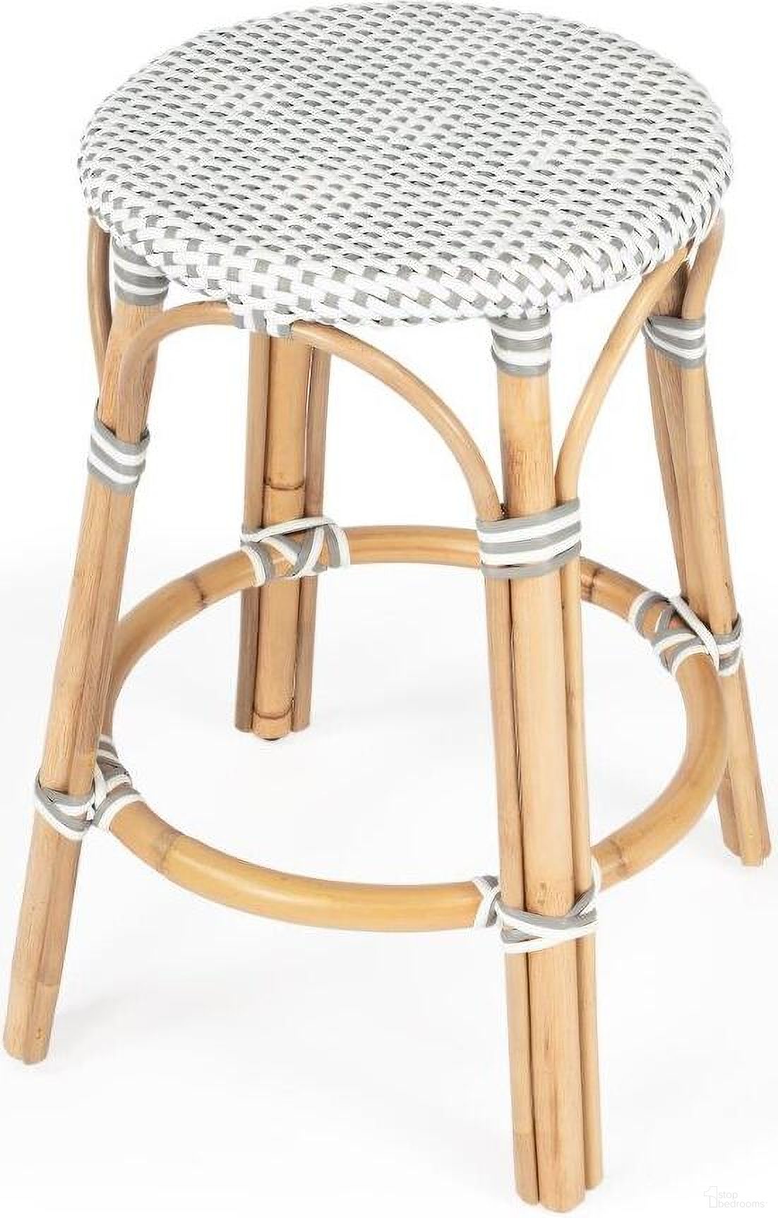 The appearance of Butler Tobias Grey and White Rattan Counter Stool 9371329 designed by Butler Specialty Company in the transitional interior design. This white and grey piece of furniture was selected by 1StopBedrooms from Designer's Edge Collection to add a touch of cosiness and style into your home. Sku: 9371329. Material: Rattan.