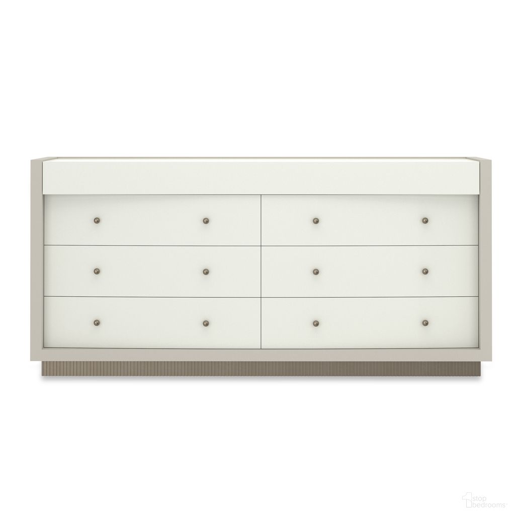 The appearance of Calais Dresser In White designed by Caracole in the modern / contemporary interior design. This white piece of furniture was selected by 1StopBedrooms from Calais Collection to add a touch of cosiness and style into your home. Sku: CLA-424-011. Material: Poplar.