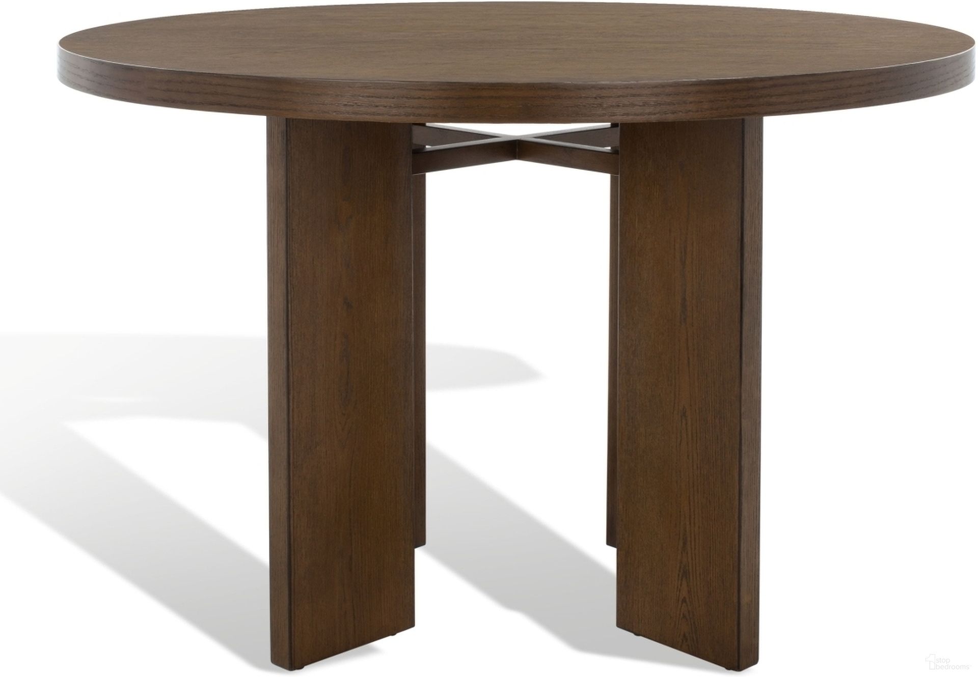 The appearance of Calamaria Round Wood Dining Table In Medium Oak designed by Safavieh Couture in the modern / contemporary interior design. This medium oak piece of furniture  was selected by 1StopBedrooms from Calamaria Collection to add a touch of cosiness and style into your home. Sku: SFV2135C. Table Base Style: Legs. Table Top Shape: Round. Material: MDF. Size: 48".