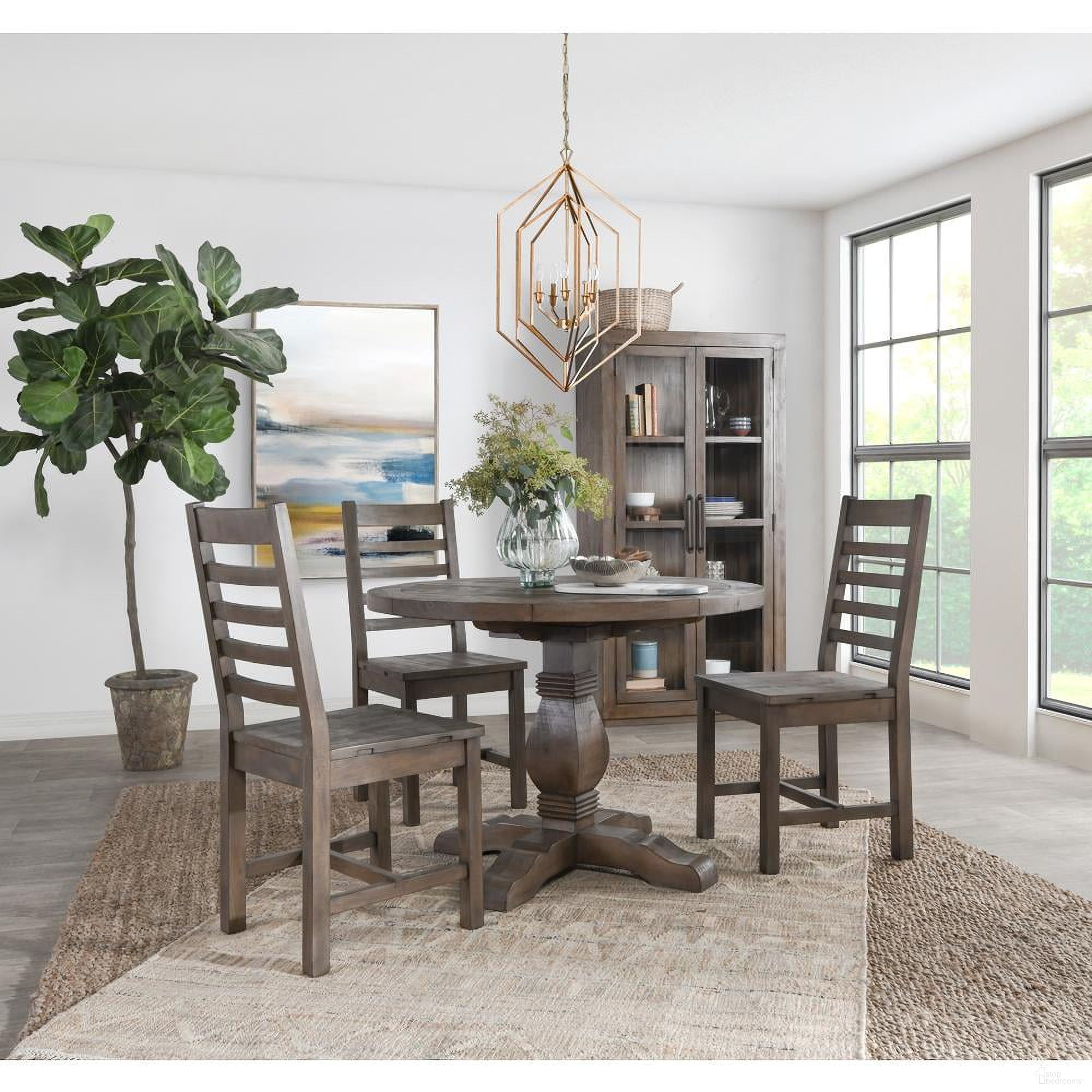 The appearance of Caleb Round Dining Room Set In Distressed Brown designed by Classic Home in the transitional interior design. This distressed brown piece of furniture was selected by 1StopBedrooms from Caleb Collection to add a touch of cosiness and style into your home. Sku: 51030595;53004425;53004425. Table Base Style: Pedestal. Size: 42". Material: Reclaimed Pine.