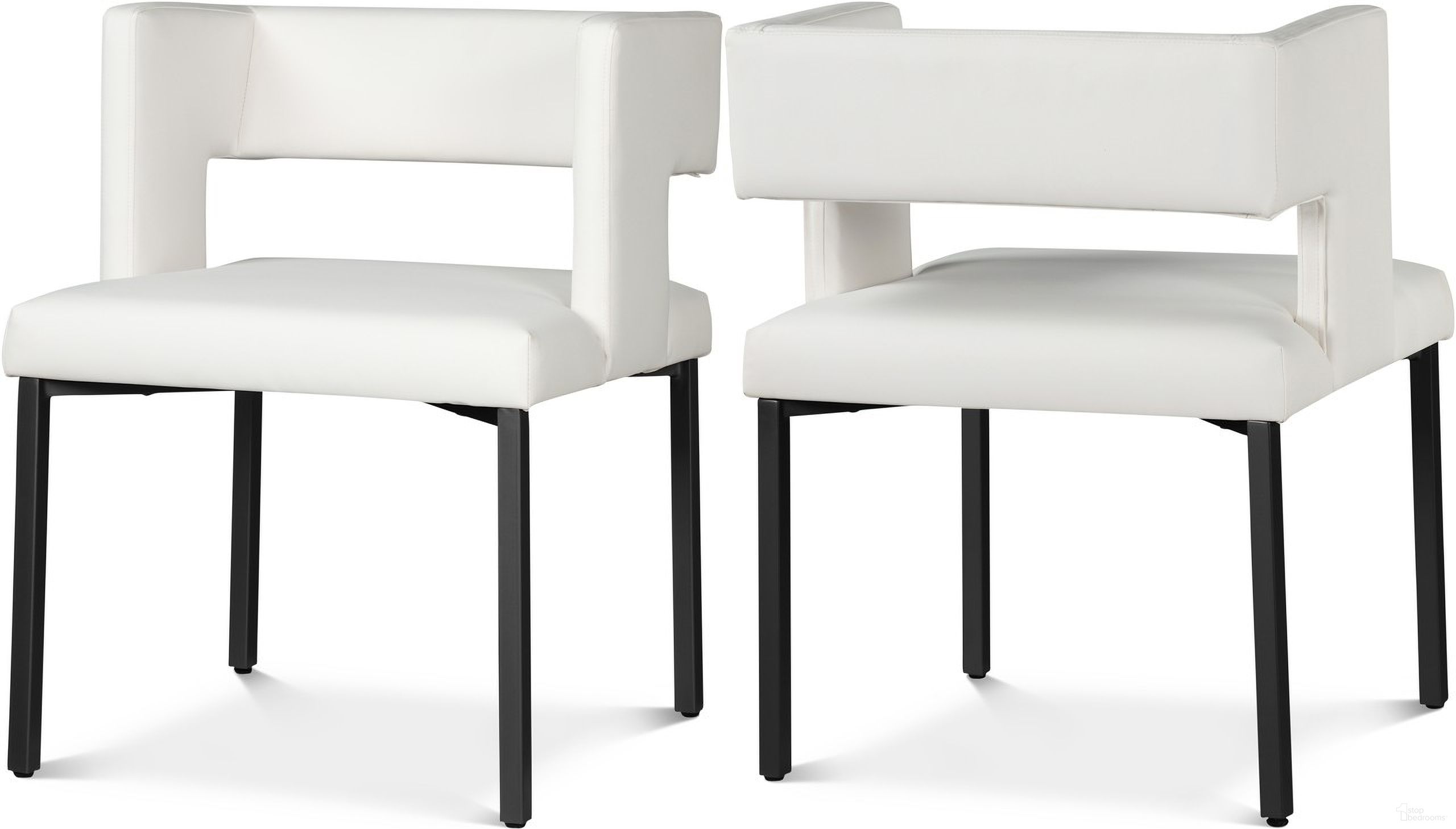 The appearance of Caleb Vegan Leather Dining Chair Set of 2 In White/Matte Black designed by Meridian in the modern / contemporary interior design. This white piece of furniture was selected by 1StopBedrooms from Caleb Collection to add a touch of cosiness and style into your home. Sku: 968White-C. Material: Wood. Chair Type: Side Chair.