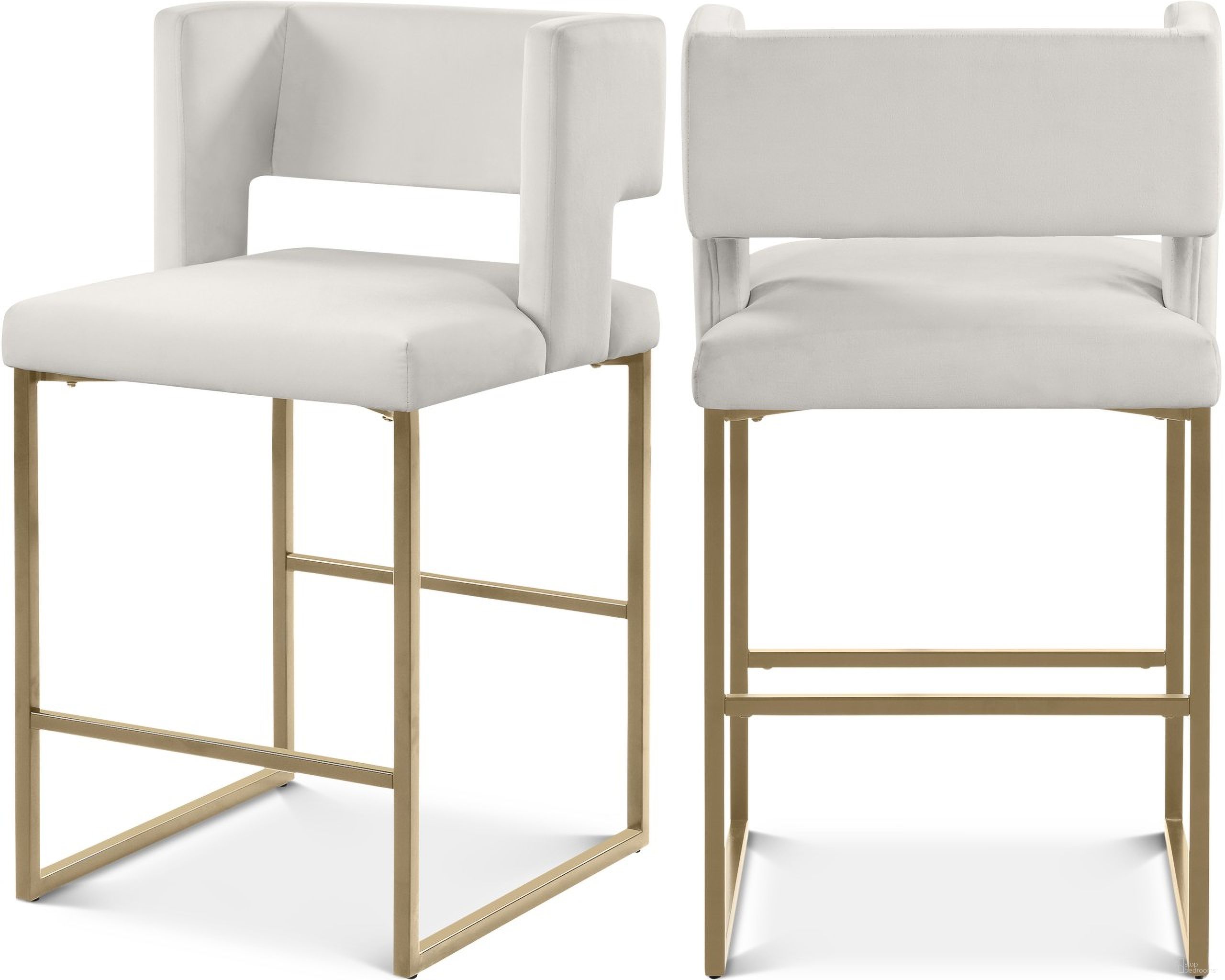 The appearance of Caleb Velvet Counter Stool Set of 2 In Cream/Brushed Gold designed by Meridian in the modern / contemporary interior design. This cream velvet piece of furniture  was selected by 1StopBedrooms from Caleb Collection to add a touch of cosiness and style into your home. Sku: 969Cream-C. Material: Velvet.