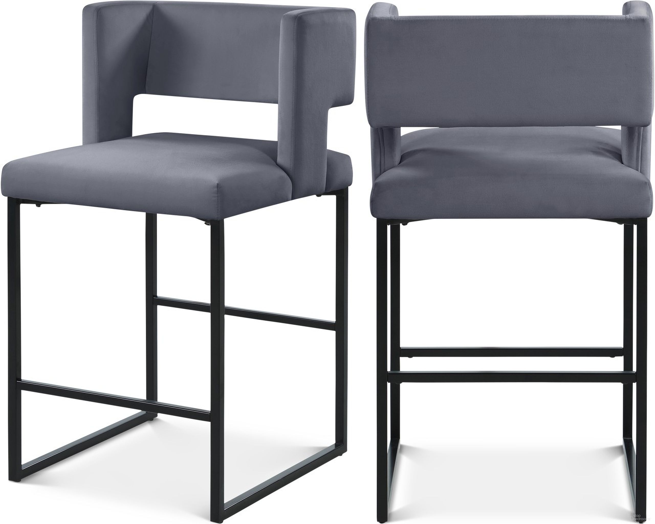 The appearance of Caleb Velvet Counter Stool Set of 2 In Grey/Matte Black designed by Meridian in the modern / contemporary interior design. This grey piece of furniture was selected by 1StopBedrooms from Caleb Collection to add a touch of cosiness and style into your home. Sku: 970Grey-C. Material: Velvet.