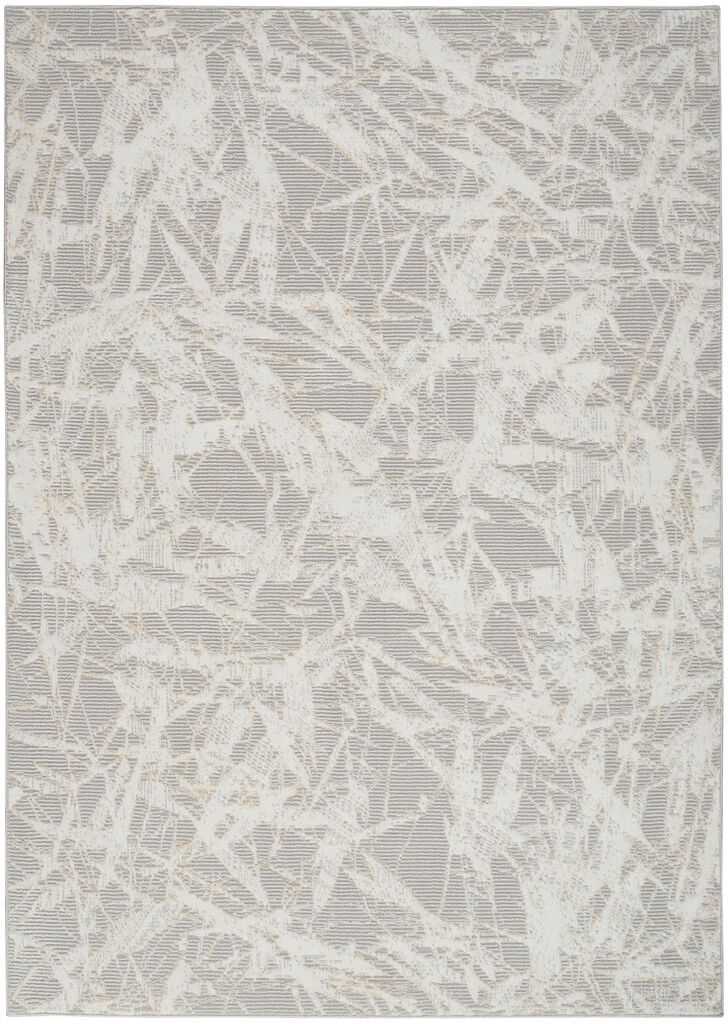 The appearance of Calvin Klein Rush 3'2" x 5' Indoor Rug In Grey and Ivory designed by Nourison in the modern / contemporary interior design. This grey/ivory piece of furniture  was selected by 1StopBedrooms from Rush Collection to add a touch of cosiness and style into your home. Sku: 99446135681. Material: Polypropylene.