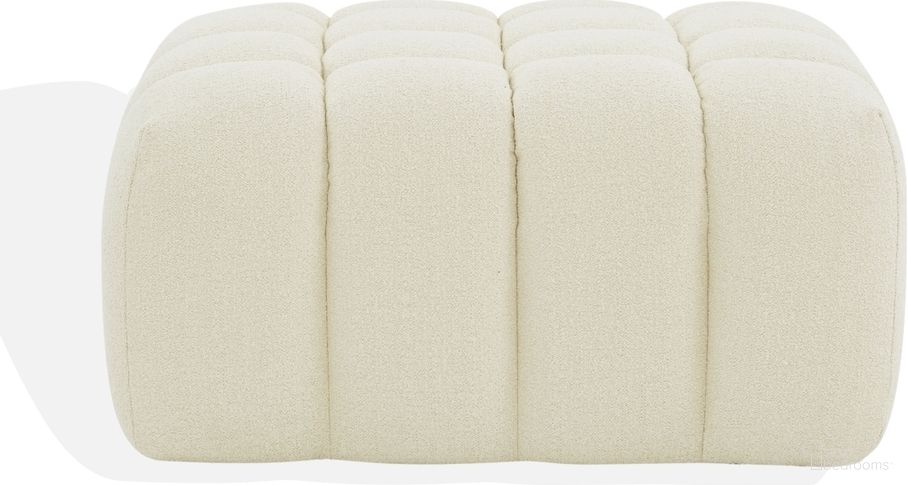 The appearance of Calyna Boucle Ottoman In Creme designed by Safavieh Couture in the modern / contemporary interior design. This creme piece of furniture  was selected by 1StopBedrooms from Calyna Collection to add a touch of cosiness and style into your home. Sku: SFV4833A. Material: Boucle.