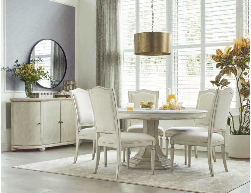 The appearance of Cambric Round Dining Set In Creme designed by American Drew in the modern / contemporary interior design. This creme piece of furniture  was selected by 1StopBedrooms from Cambric Collection to add a touch of cosiness and style into your home. Sku: 309-702BR;309-638B. Table Base Style: Pedestal. Table Top Shape: Round. Material: Wood. Size: 60".