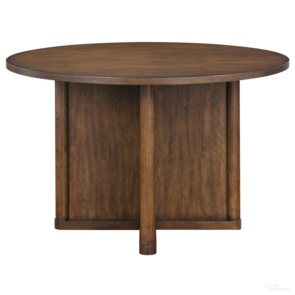 The appearance of Cambridge Dining Table In Brown designed by Steve Silver in the transitional interior design. This brown piece of furniture  was selected by 1StopBedrooms from Cambridge Collection to add a touch of cosiness and style into your home. Sku: CBR500TT;CBR500TB. Table Base Style: Pedestal. Table Top Shape: Round. Material: Rubberwood. Size: 47".