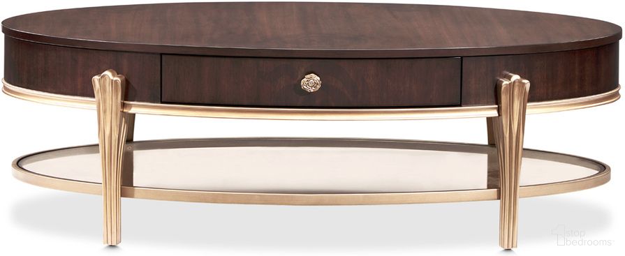The appearance of Camellia Field Oval Cocktail Table In Warm Pecan designed by Michael Amini in the transitional interior design. This warm pecan piece of furniture was selected by 1StopBedrooms from Camellia Field Collection to add a touch of cosiness and style into your home. Sku: N9090201-400. Material: Solid Wood.