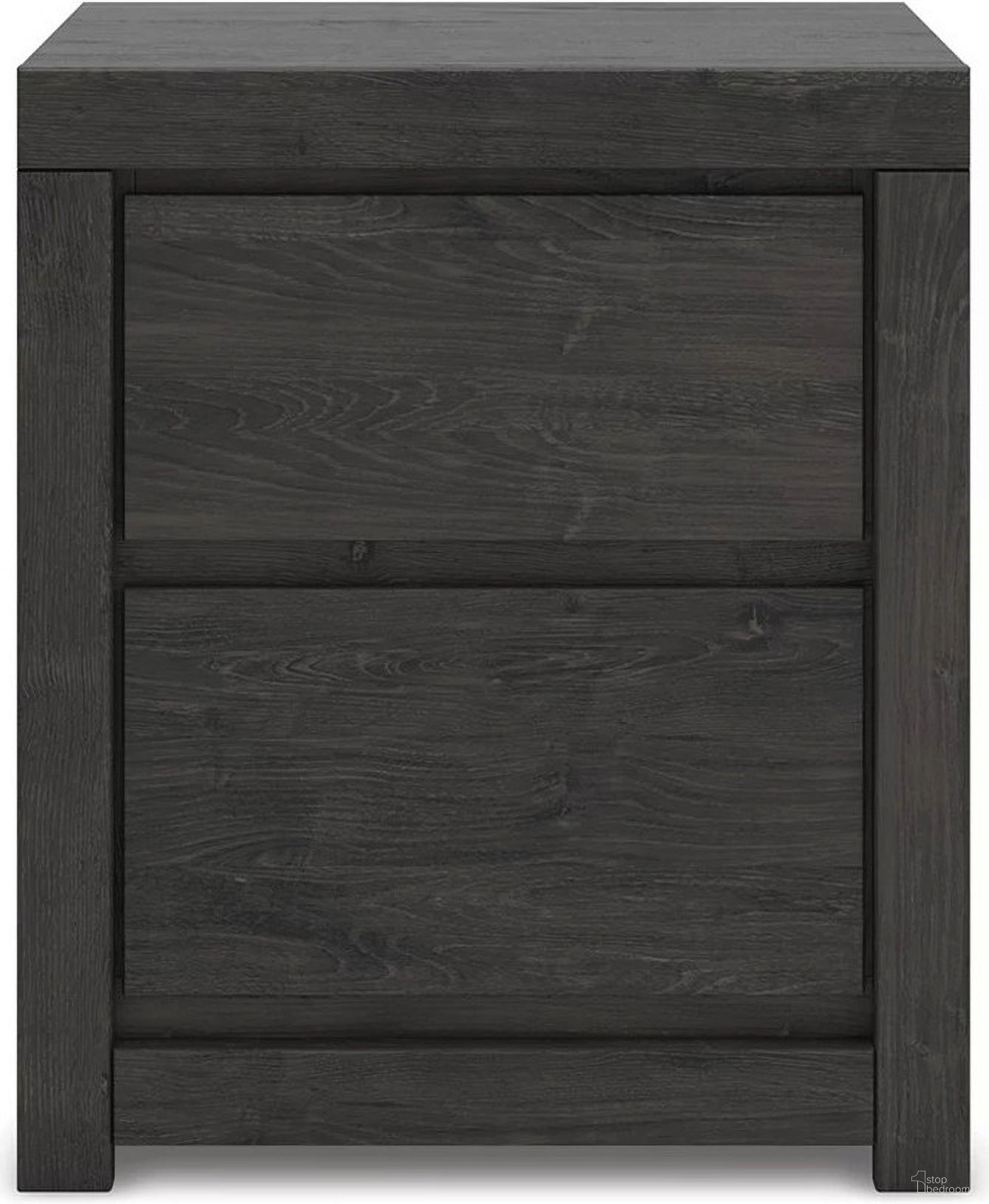 The appearance of Candanew Nightstand In Charcoal designed by Signature Design by Ashley in the transitional interior design. This charcoal piece of furniture  was selected by 1StopBedrooms from Candanew Collection to add a touch of cosiness and style into your home. Sku: NCB3370-92. Material: Wood.