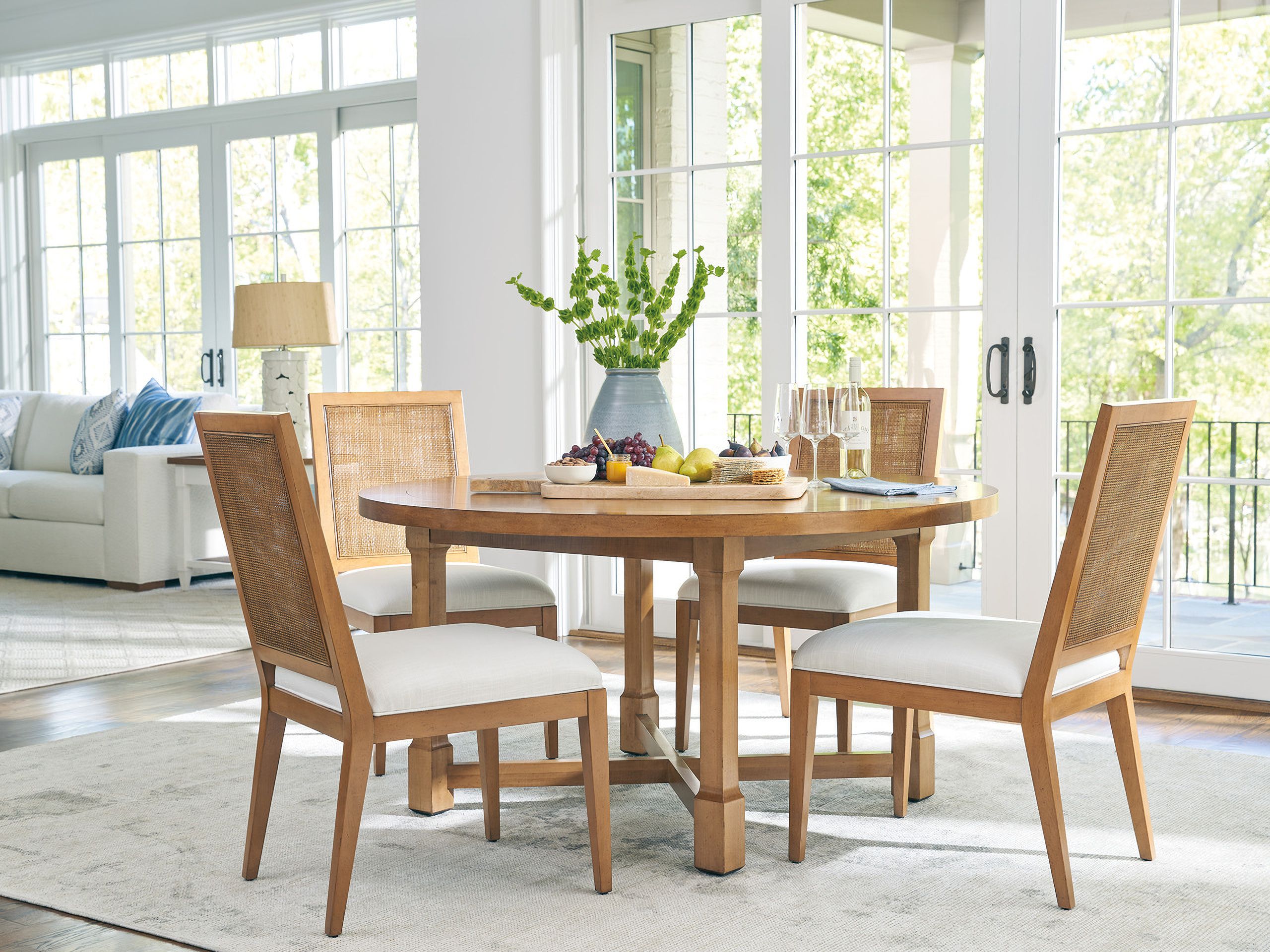 The appearance of Capistrano Dining Set In Table Rock designed by Barclay Butera in the transitional interior design. This table rock piece of furniture  was selected by 1StopBedrooms from Laguna Collection to add a touch of cosiness and style into your home. Sku: 934-875C;934-880-01. Table Base Style: Trestle. Table Top Shape: Oval. Material: Wood. Size: 58" x 58".