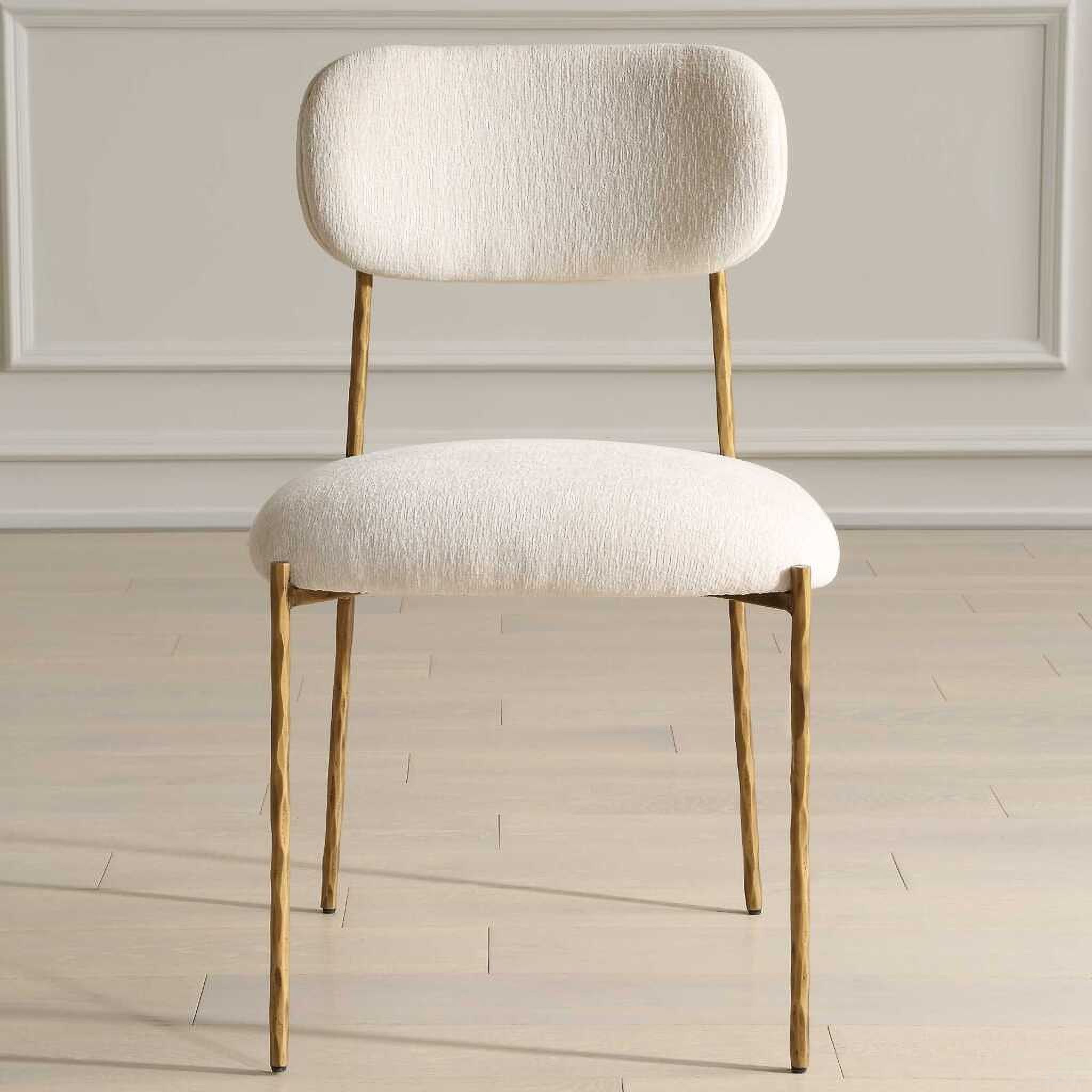 The appearance of Capture Dining Chair Set of 2 In Gold and White designed by Uttermost in the modern / contemporary interior design. This gold and white piece of furniture was selected by 1StopBedrooms from Capture Collection to add a touch of cosiness and style into your home. Sku: 23859-2. Material: Iron. Chair Type: Side Chair.