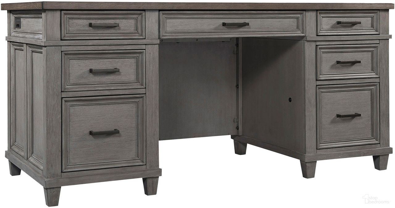 The appearance of Caraway 66 Inch Executive Desk In Grey designed by Aspenhome in the country / farmhouse interior design. This grey piece of furniture  was selected by 1StopBedrooms from Caraway Collection to add a touch of cosiness and style into your home. Sku: I248-303-SLT-1. Material: Wood.