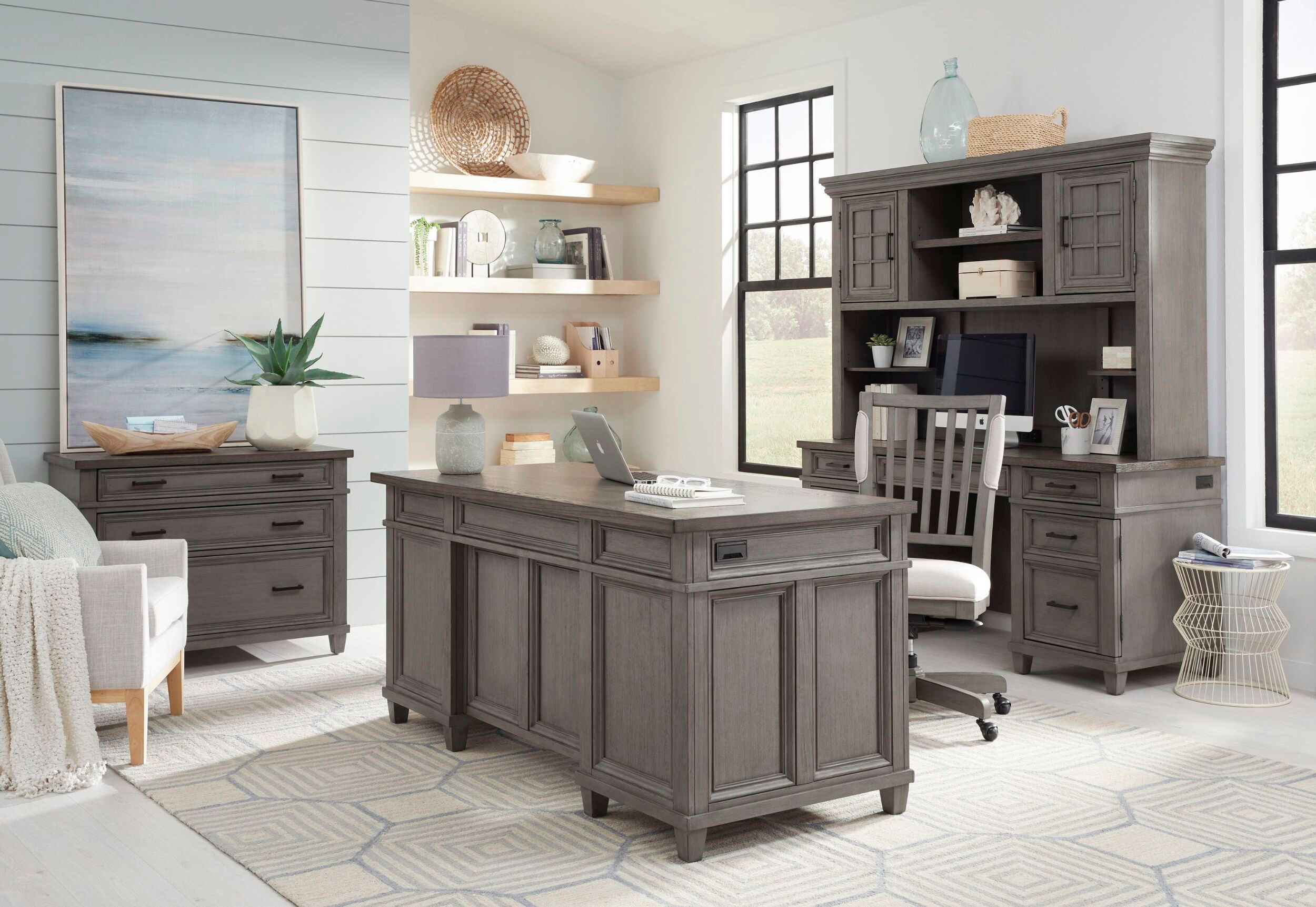 The appearance of Caraway Aged Slate 66 Inch Executive Home Office Set designed by Aspenhome in the transitional interior design. This gray piece of furniture  was selected by 1StopBedrooms from Caraway Collection to add a touch of cosiness and style into your home. Sku: I248-303-SLT-1;I248-366-SLT-1. Material: Wood.