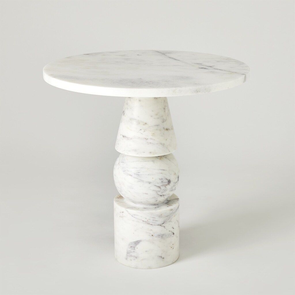 The appearance of Cargo Banswara Marble Table In White designed by Global Views in the modern / contemporary interior design. This white piece of furniture  was selected by 1StopBedrooms from Cargo Collection to add a touch of cosiness and style into your home. Sku: 791537. Material: Marble.