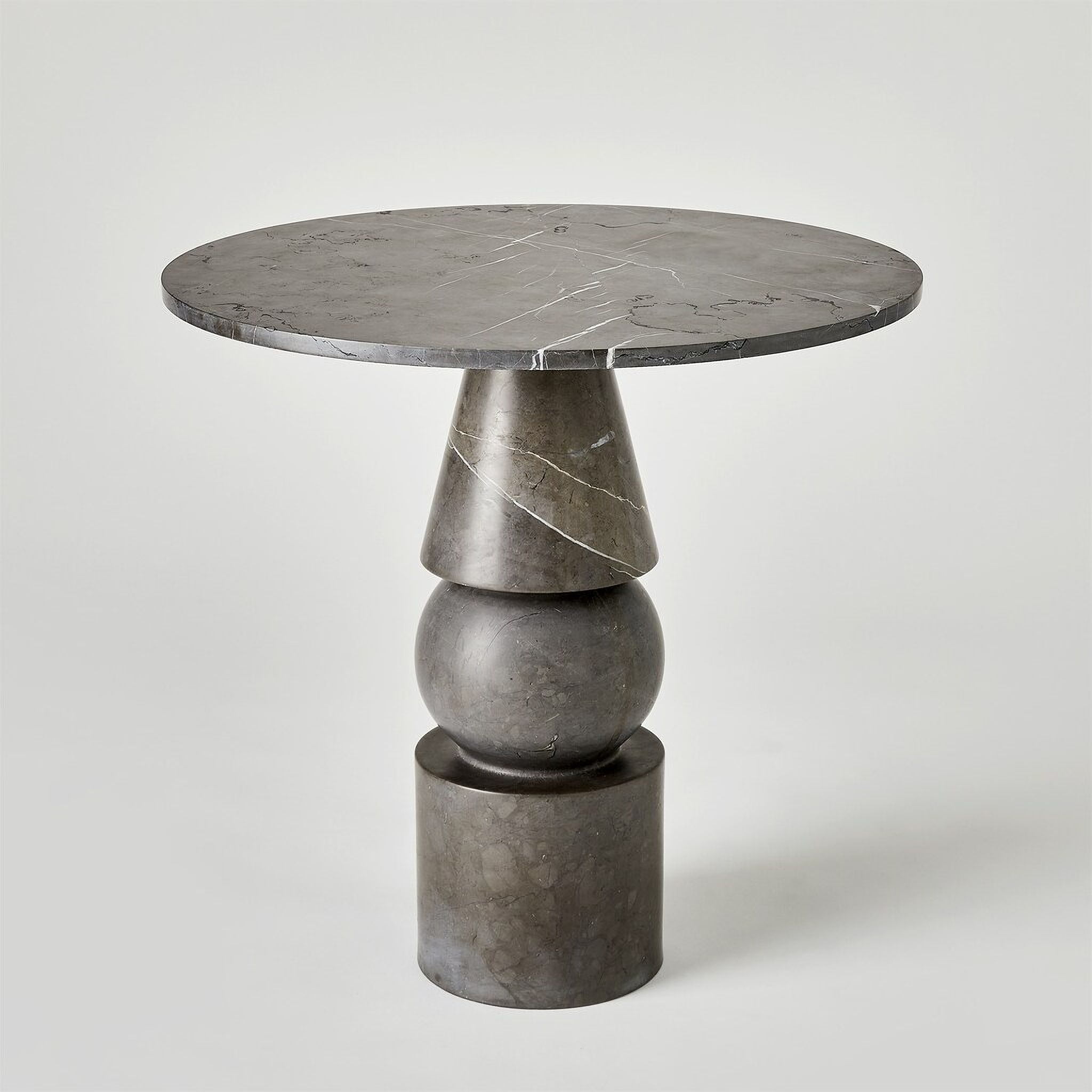 The appearance of Cargo Graffito Marble Table In Black designed by Global Views in the modern / contemporary interior design. This black piece of furniture  was selected by 1StopBedrooms from Cargo Collection to add a touch of cosiness and style into your home. Sku: 791556. Material: Marble.