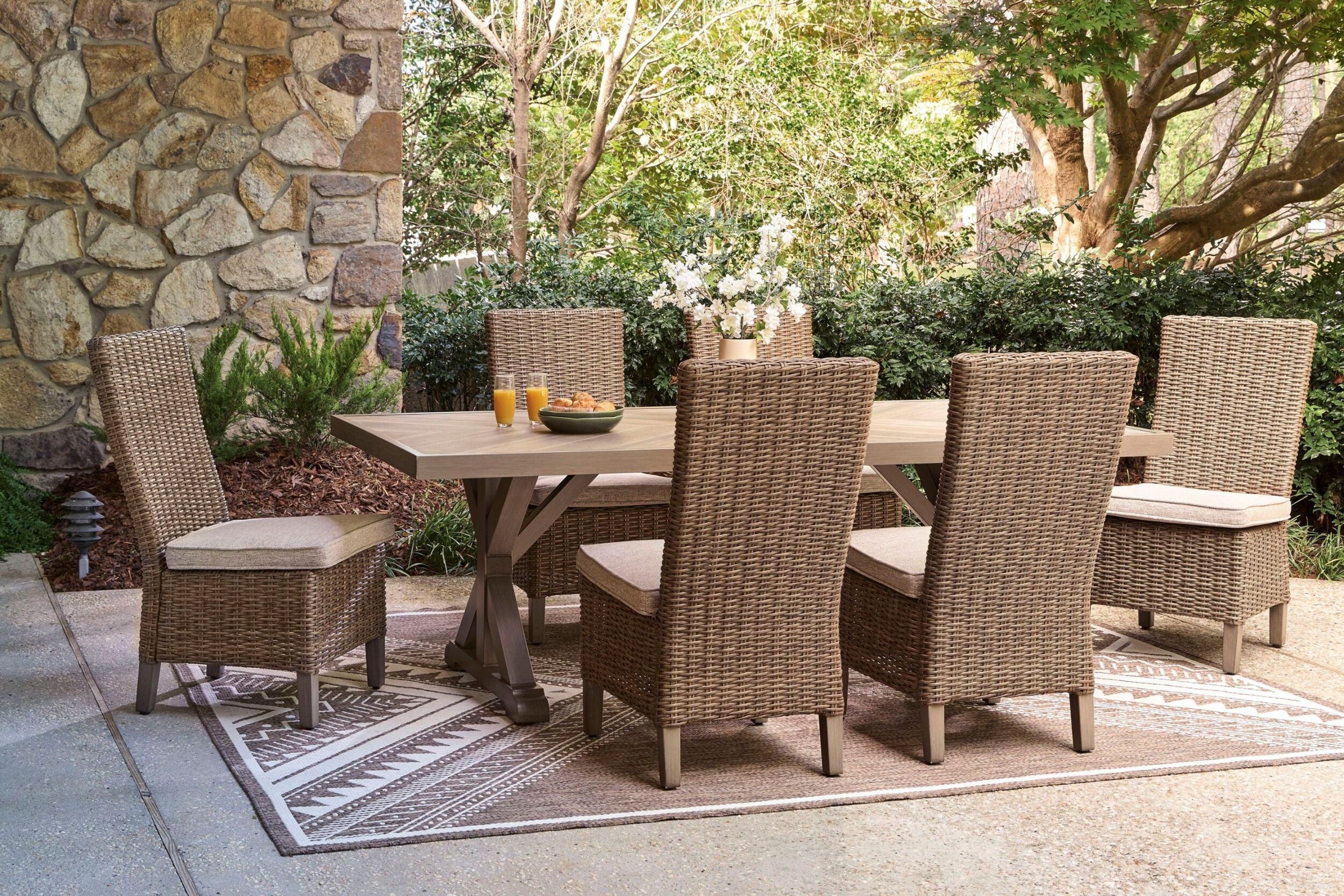 The appearance of Carmel Bay Outdoor Dining Room Set In Beige designed by Signature Design by Ashley in the transitional interior design. This beige piece of furniture was selected by 1StopBedrooms from Carmel Bay Collection to add a touch of cosiness and style into your home. Sku: NCP790-625;NCP790-601. Material: Wood. Table Top Shape: Rectangular.