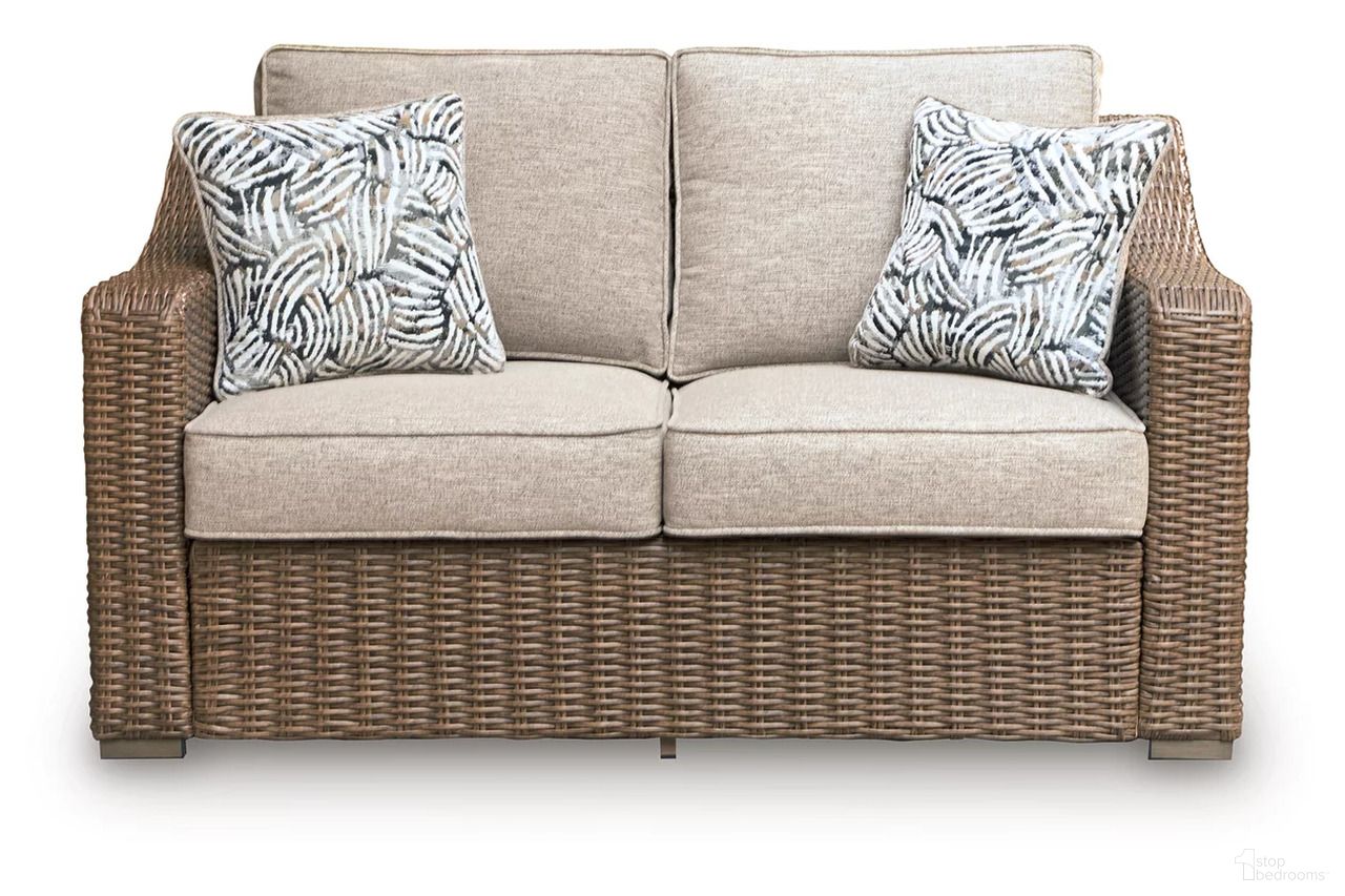 The appearance of Carmel Bay Outdoor Loveseat with Cushion In Beige designed by Signature Design by Ashley in the transitional interior design. This beige piece of furniture was selected by 1StopBedrooms from Carmel Bay Collection to add a touch of cosiness and style into your home. Sku: NCP790-835. Material: Fabric.