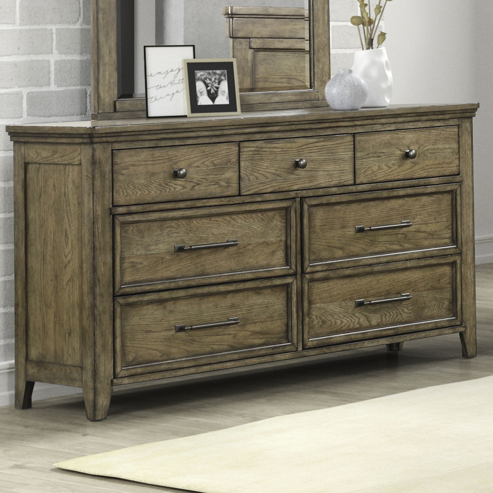 The appearance of Carolina Park 7 Drawer Dresser In Brown designed by Liberty in the transitional interior design. This brown piece of furniture was selected by 1StopBedrooms from Carolina Park Collection to add a touch of cosiness and style into your home. Sku: 930-BR31. Material: Solid Rubberwood.