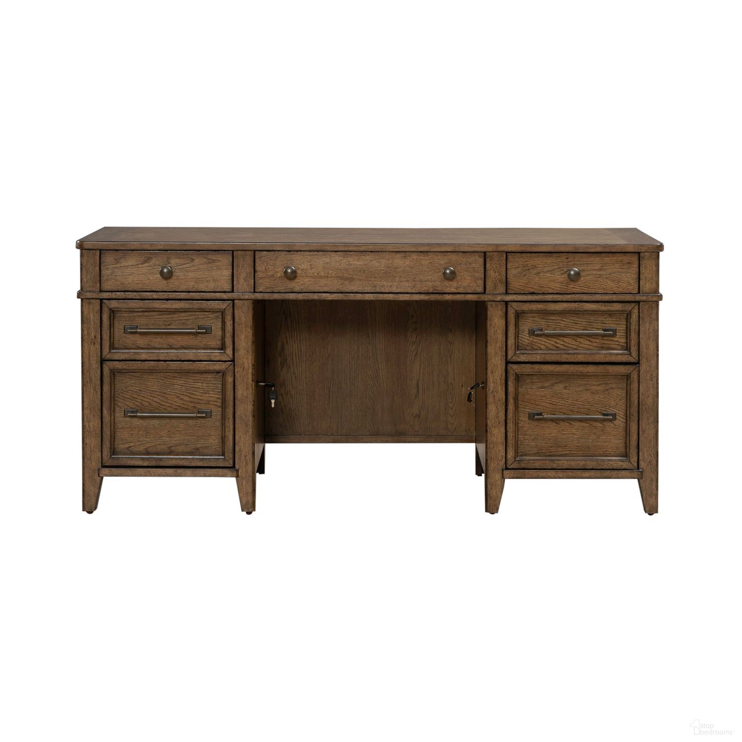 The appearance of Carolina Park Jr Executive Credenza In Amber Brown designed by Liberty in the transitional interior design. This amber brown piece of furniture was selected by 1StopBedrooms from Carolina Park Collection to add a touch of cosiness and style into your home. Sku: 930-HO120B;930-HO120T. Material: Solid Rubberwood.
