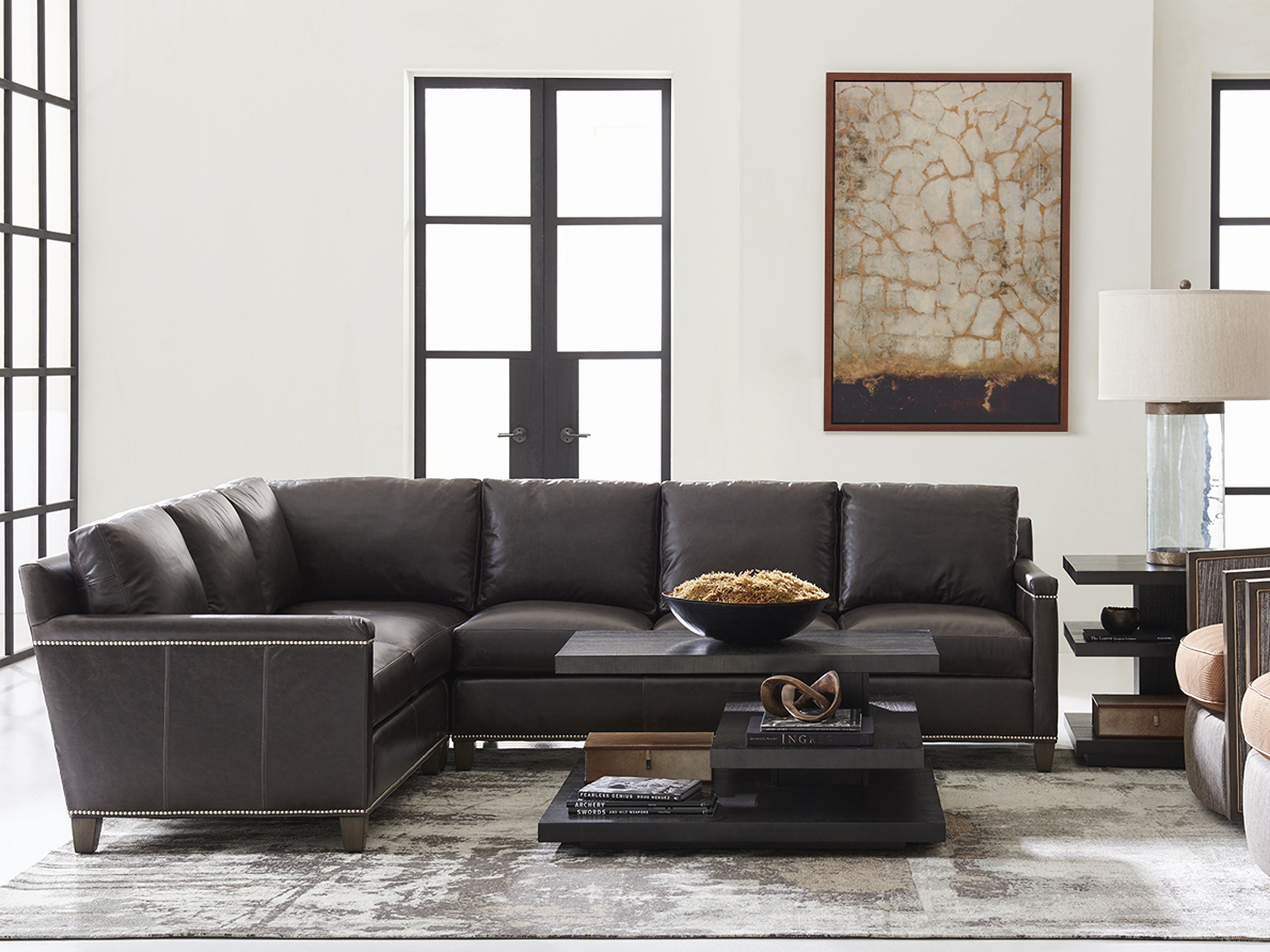 The appearance of Lexington Leather Carrera Strada Leather Sectional Sofa designed by Lexington in the modern / contemporary interior design. This gray piece of furniture was selected by 1StopBedrooms from Lexington Leather Collection to add a touch of cosiness and style into your home. Sku: LL7728-50S-40. Material: Leather. Layout: L-Shape.
