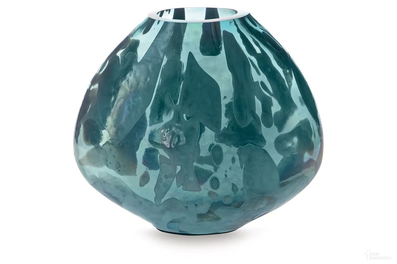 The appearance of Cartshaw 7 Inch Vase In Iridescent Teal designed by Signature Design by Ashley in the modern / contemporary interior design. This iridescent teal piece of furniture was selected by 1StopBedrooms from Cartshaw Collection to add a touch of cosiness and style into your home. Sku: A2000738. Material: Glass.