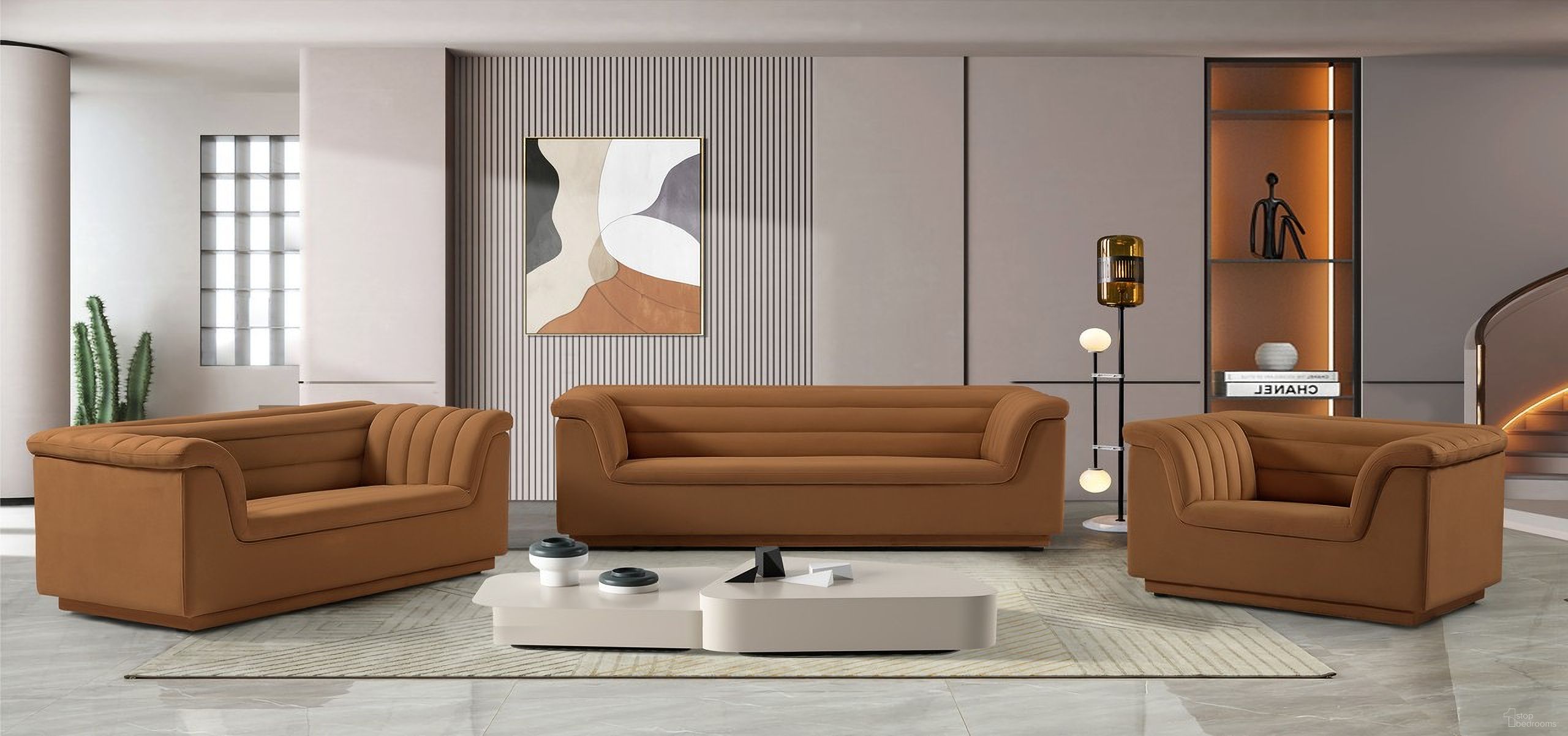 The appearance of Cascade Living Room Set In Saddle designed by Meridian in the modern / contemporary interior design. This saddle piece of furniture was selected by 1StopBedrooms from Cascade Collection to add a touch of cosiness and style into your home. Sku: 192Saddle-S;192Saddle-L. Material: Velvet.