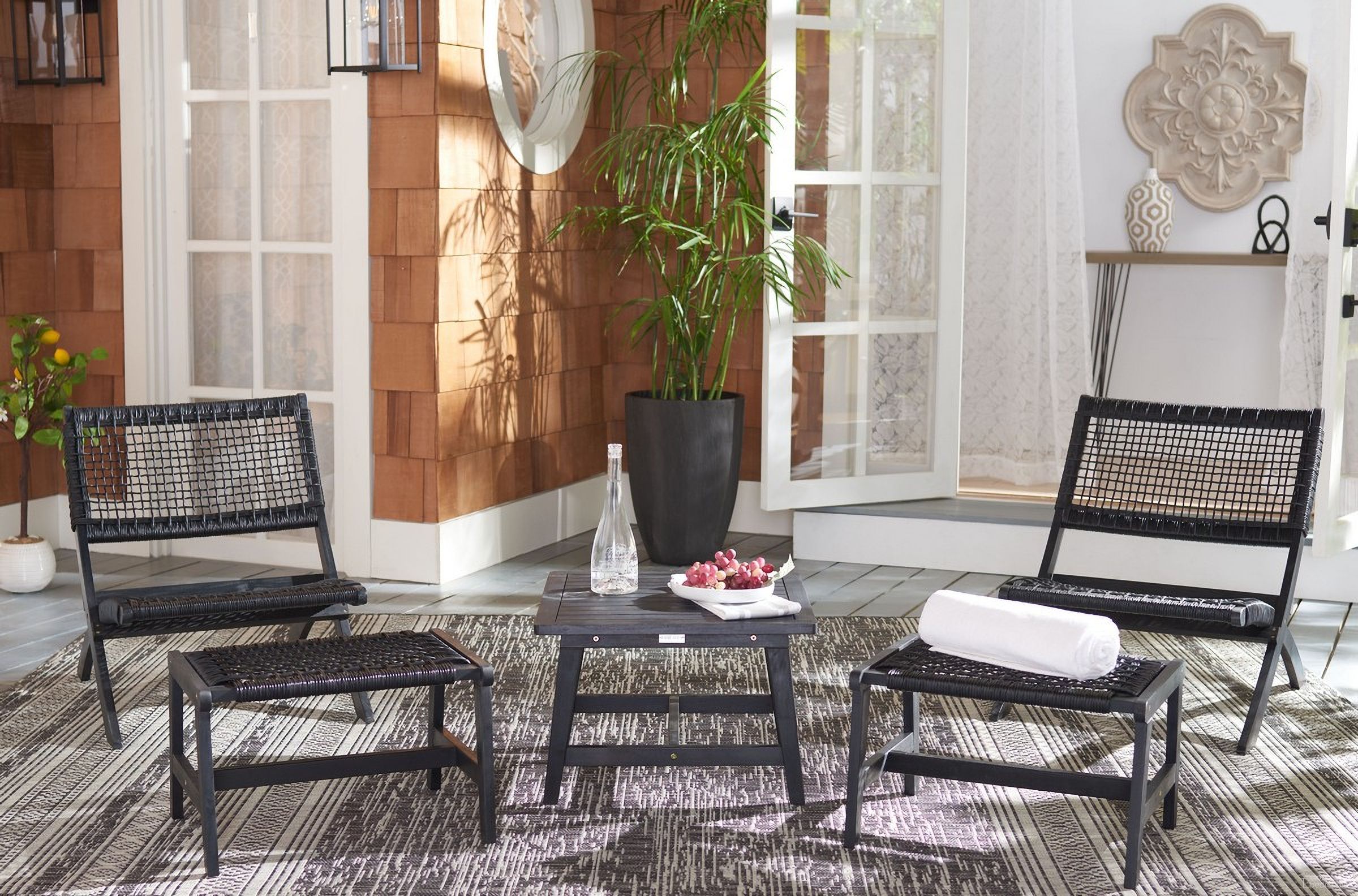 The appearance of Casella Outdoor Set in Black designed by Safavieh in the coastal interior design. This black piece of furniture was selected by 1StopBedrooms from Casella Collection to add a touch of cosiness and style into your home. Sku: PAT7077C. Material: Wood.