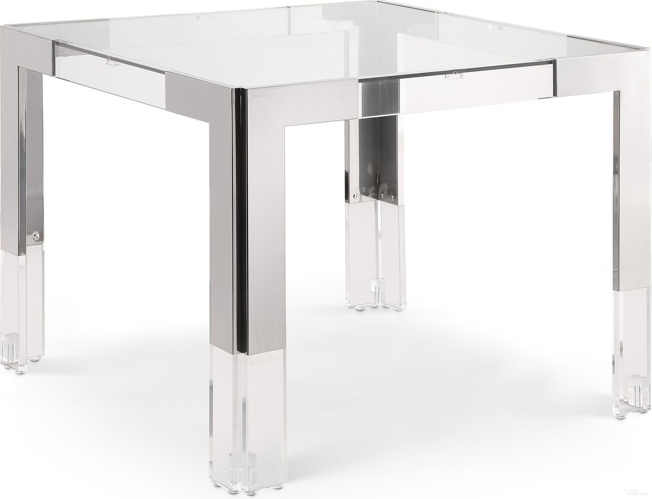 The appearance of Casper Dining Table In Chrome designed by Meridian in the modern / contemporary interior design. This chrome piece of furniture  was selected by 1StopBedrooms from Casper Collection to add a touch of cosiness and style into your home. Sku: 721-T Box 1/2 (Glass Top);721-T Box 2/2 (Legs). Table Base Style: Legs. Table Top Shape: Square. Material: Stainless Steel. Size: 38" x 38".