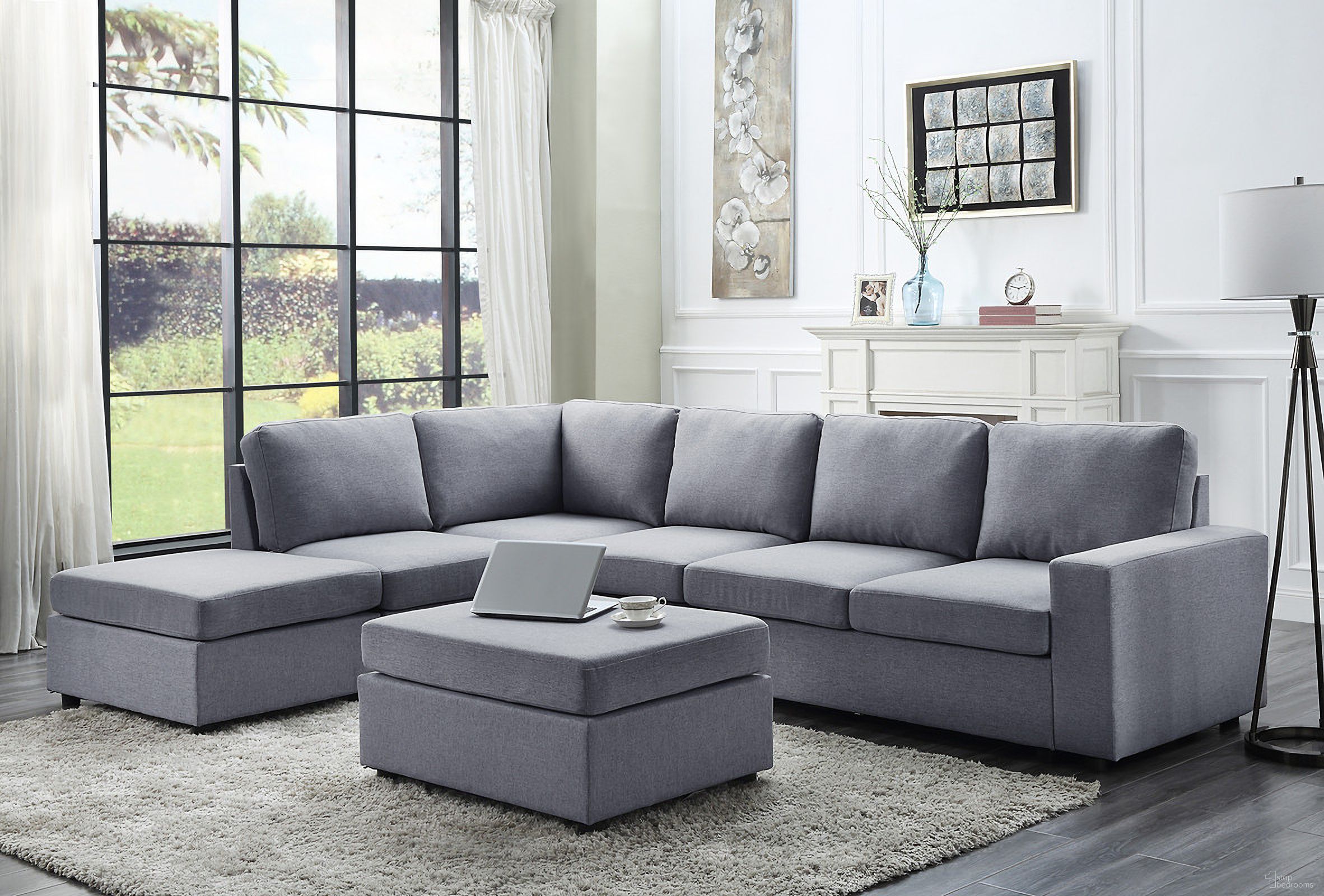 The appearance of Cassia 120 Inch Linen 7 Seat Reversible Modular Sectional Sofa with Ottoman In Light Gray designed by Lilola Home in the modern / contemporary interior design. This light gray piece of furniture  was selected by 1StopBedrooms from Cassia Collection to add a touch of cosiness and style into your home. Sku: 81802-A;81802-A;81802-ARM;81802-C;81802-LS;81802-O;81802-O. Material: Linen. Layout: L-Shape.