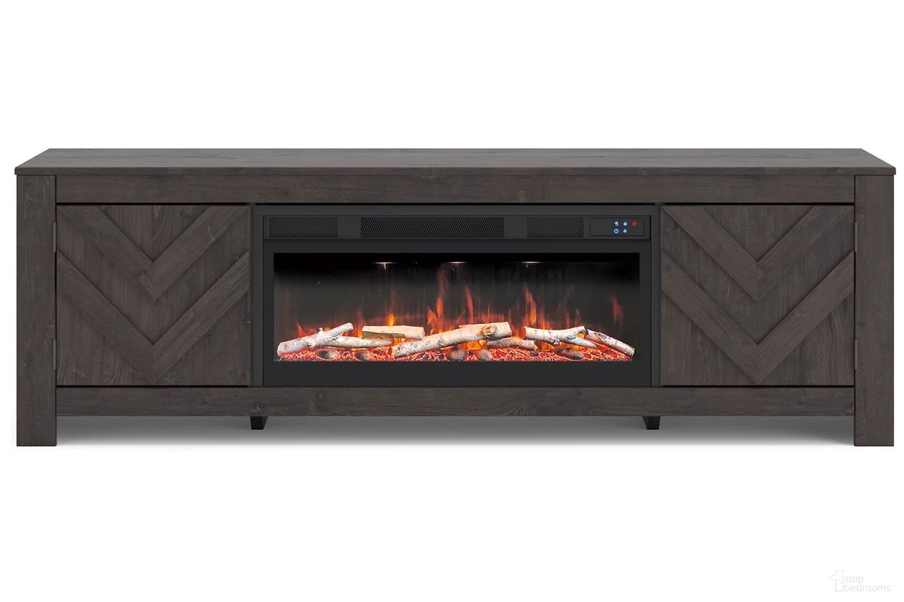 The appearance of Cayboni 71 Inch TV Stand with Electric Fireplace In Black designed by Signature Design by Ashley in the transitional interior design. This black piece of furniture  was selected by 1StopBedrooms from Cayboni Collection to add a touch of cosiness and style into your home. Sku: W100-703;W3789-68.