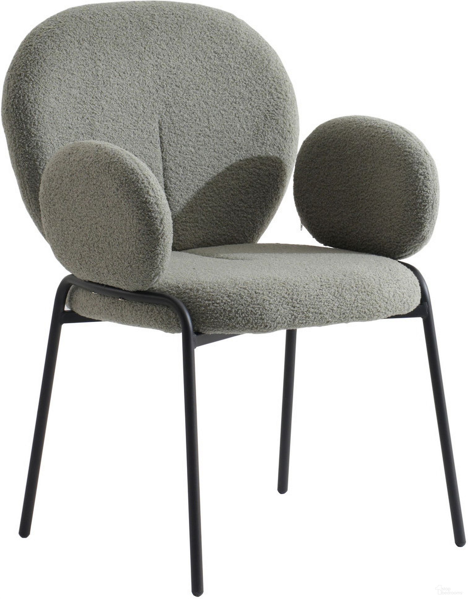 The appearance of Celestial Boucle Dining Arm Chair In Green designed by LeisureMod in the modern / contemporary interior design. This green piece of furniture was selected by 1StopBedrooms from Celestial Collection to add a touch of cosiness and style into your home. Sku: CCABL-23G. Material: Iron. Chair Type: Arm Chair.