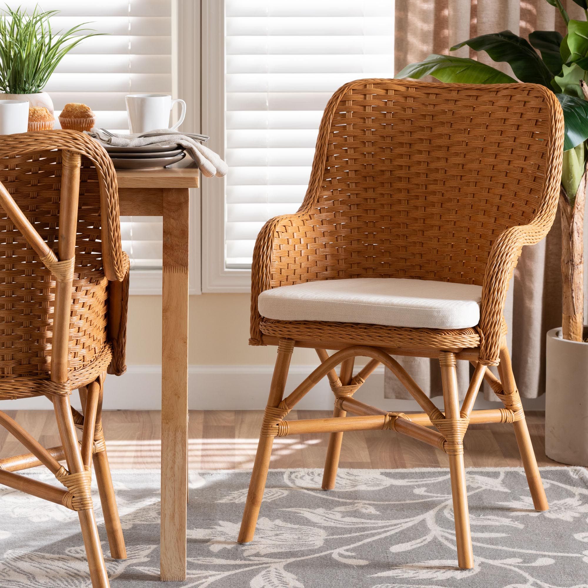 The appearance of Celsie Rattan Dining Chair In Light Honey and White designed by Baxton Studio in the bohemian interior design. This light honey and white piece of furniture was selected by 1StopBedrooms from Celsie Collection to add a touch of cosiness and style into your home. Sku: Celsie-Light Honey Rattan Cushioned-DC. Material: Natural Rattan. Chair Type: Arm Chair.