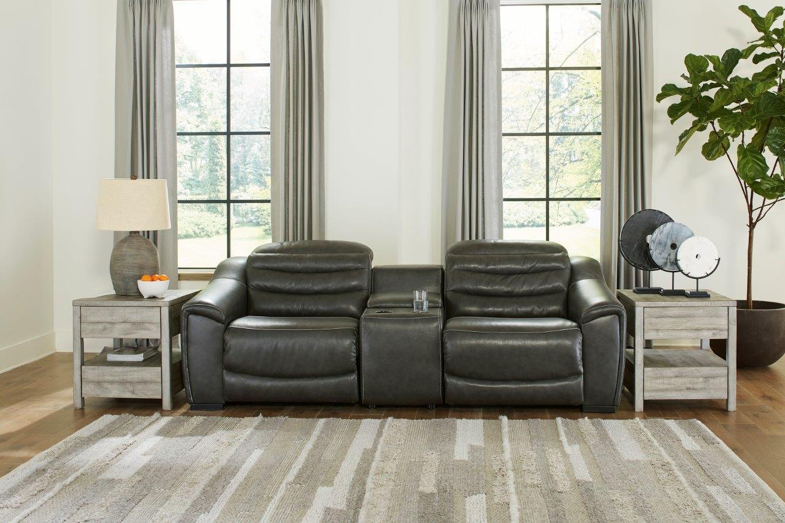 The appearance of Center Line Power Reclining Console Loveseat In Dark Gray designed by Signature Design by Ashley in the modern / contemporary interior design. This dark gray piece of furniture was selected by 1StopBedrooms from Center Line Collection to add a touch of cosiness and style into your home. Sku: U6340457;U6340458;U6340462. Material: Leather Match.