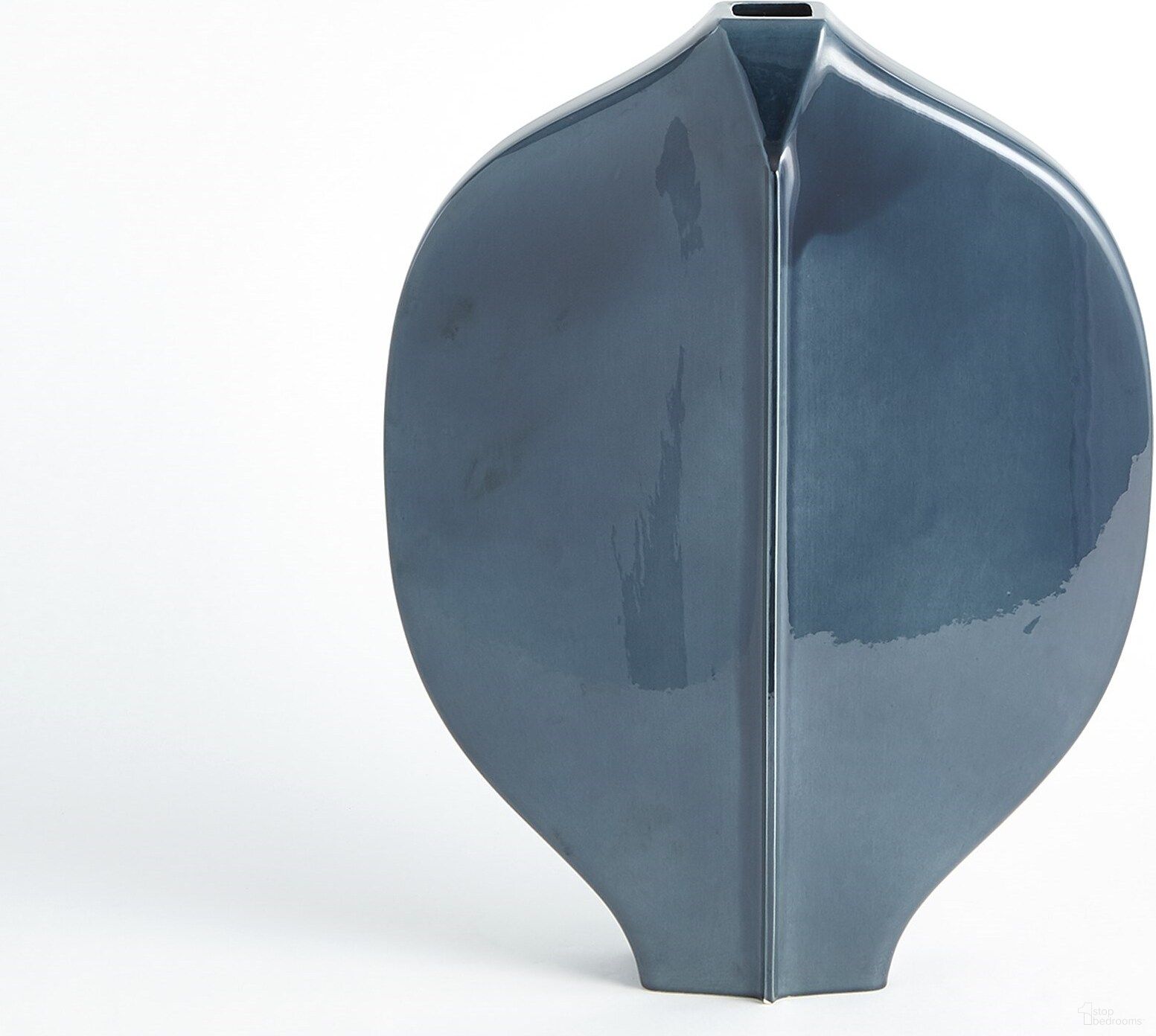 The appearance of Center Ridge Medium Vase In Blue designed by Global Views in the modern / contemporary interior design. This blue piece of furniture was selected by 1StopBedrooms from Center Collection to add a touch of cosiness and style into your home. Sku: 110765. Material: Ceramic.